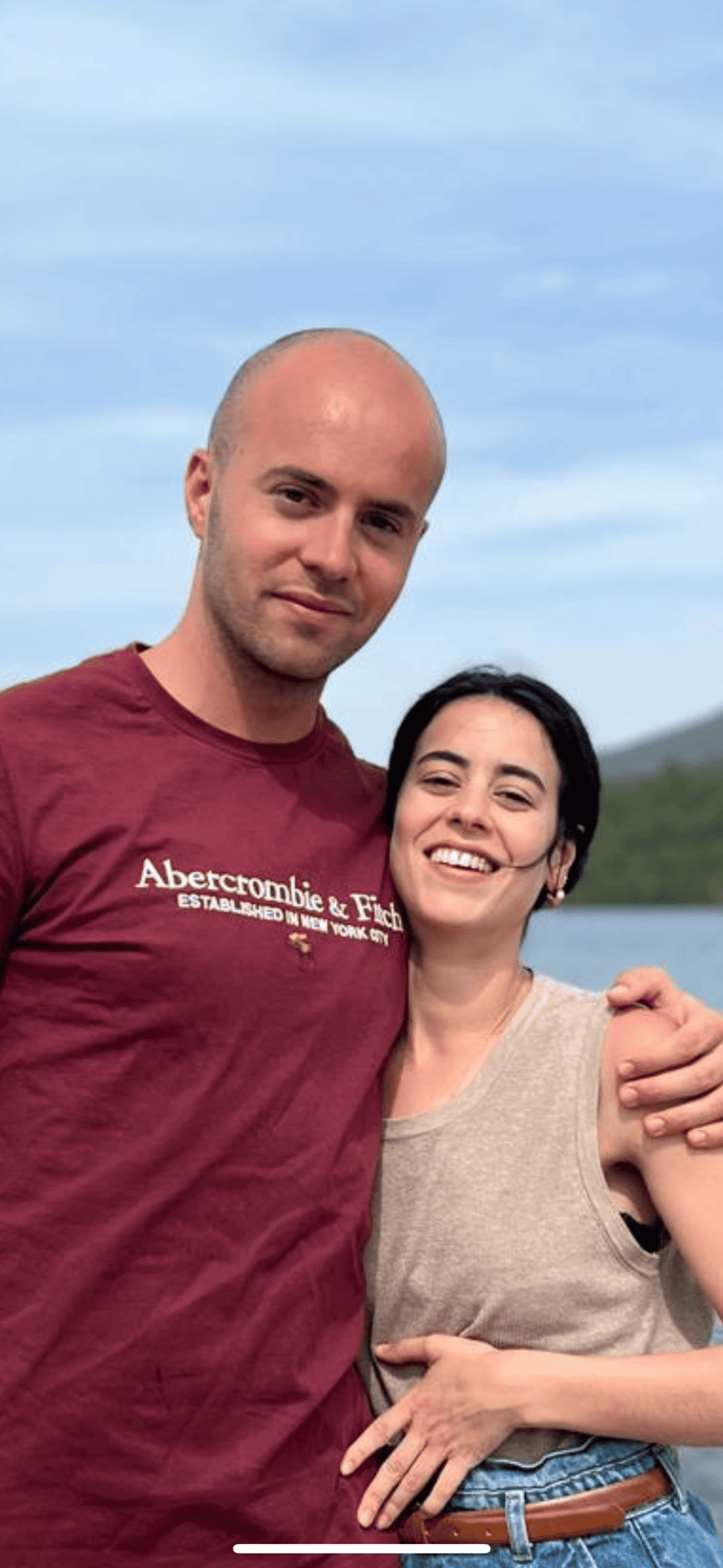 couple wearing silver-colored rings