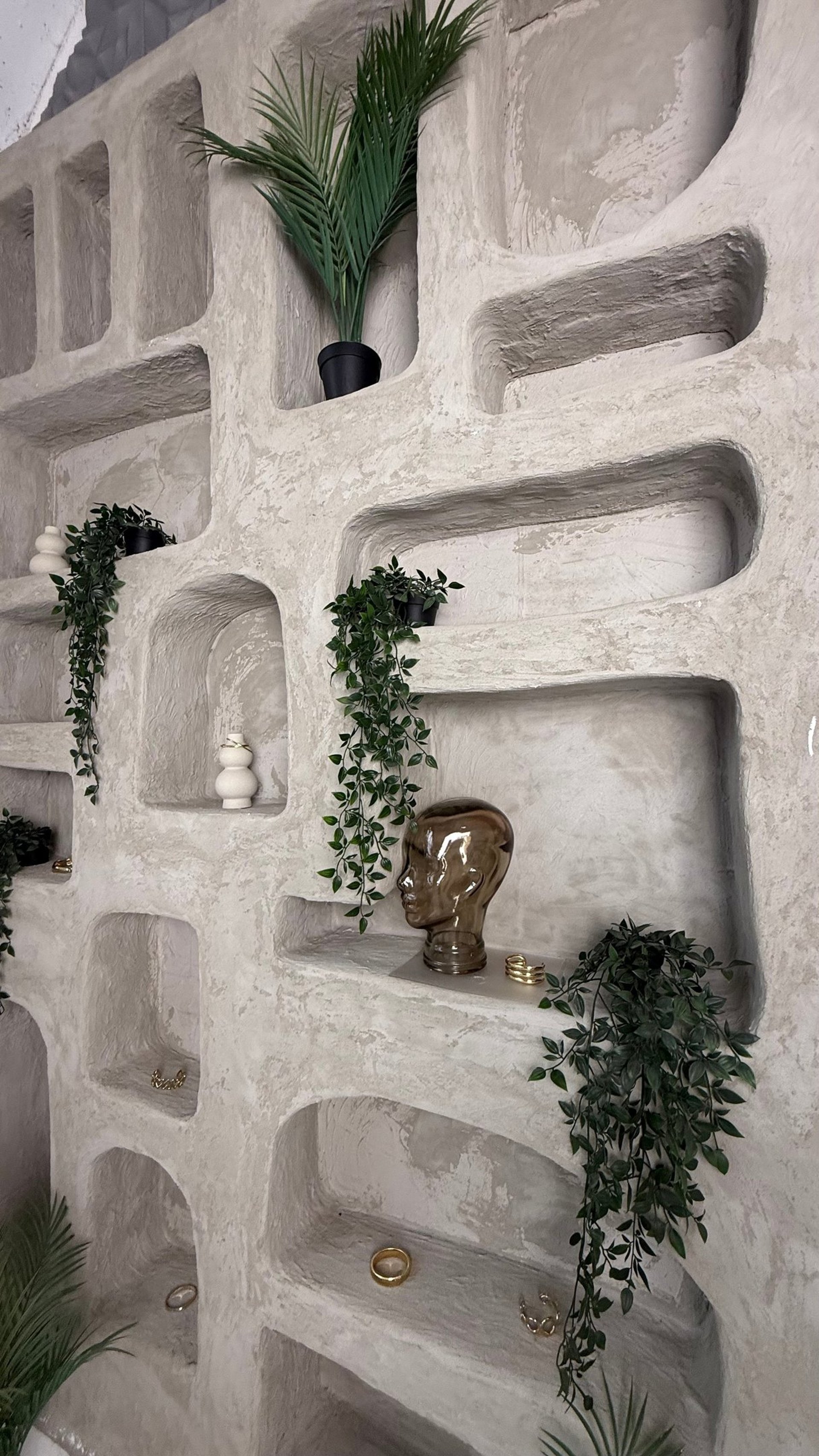 an abstract photo of a curved building with a blue sky in the background