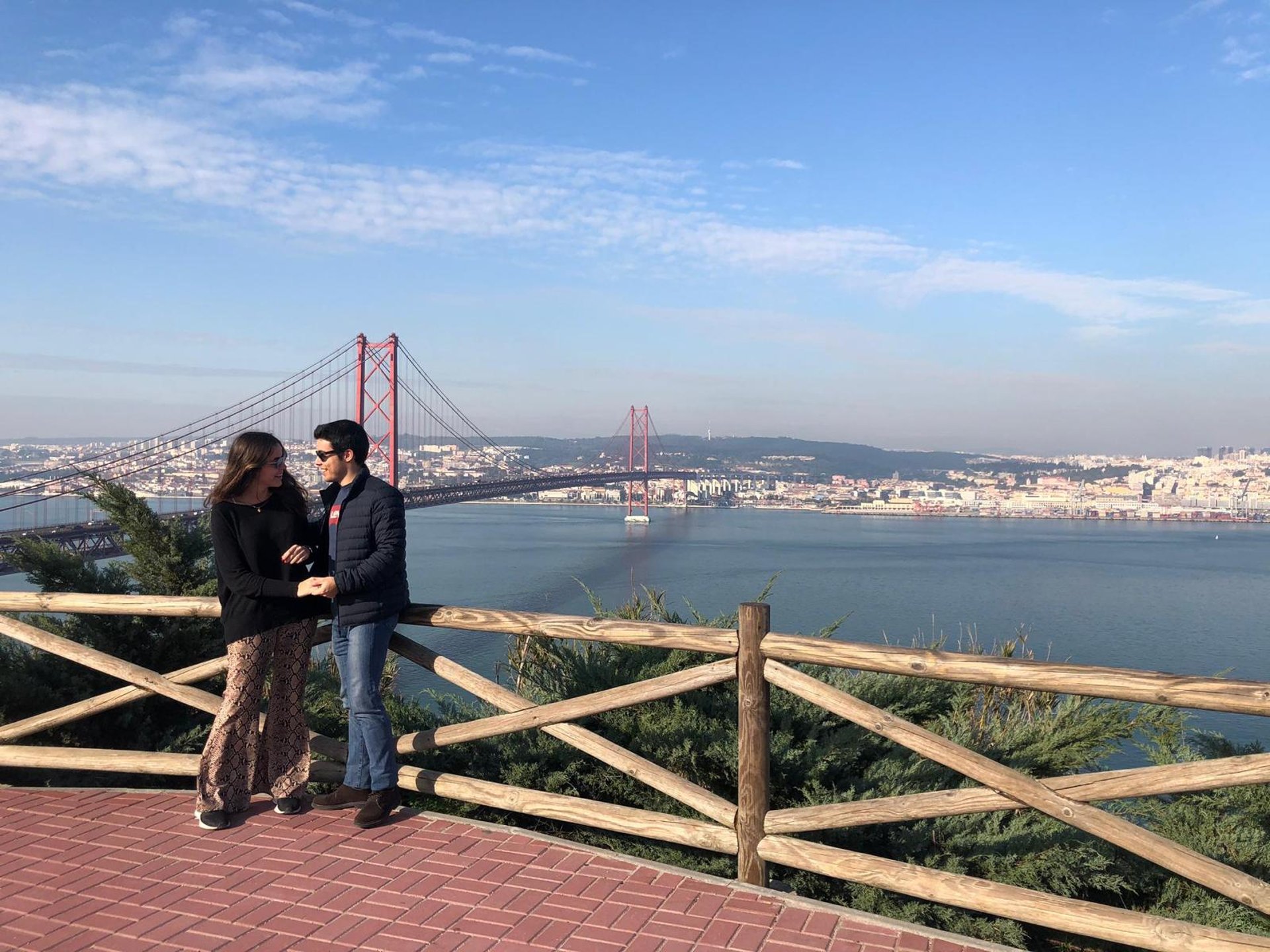 couple wearing silver-colored rings