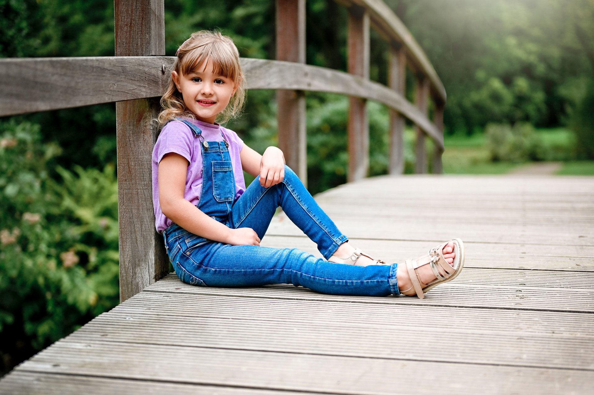 woman wearing yellow long-sleeved dress under white clouds and blue sky during daytime