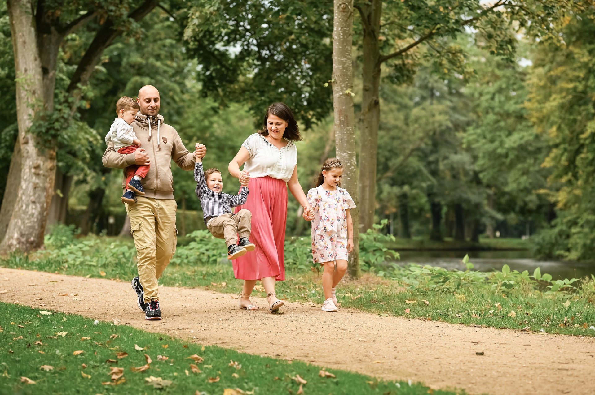 woman wearing yellow long-sleeved dress under white clouds and blue sky during daytime