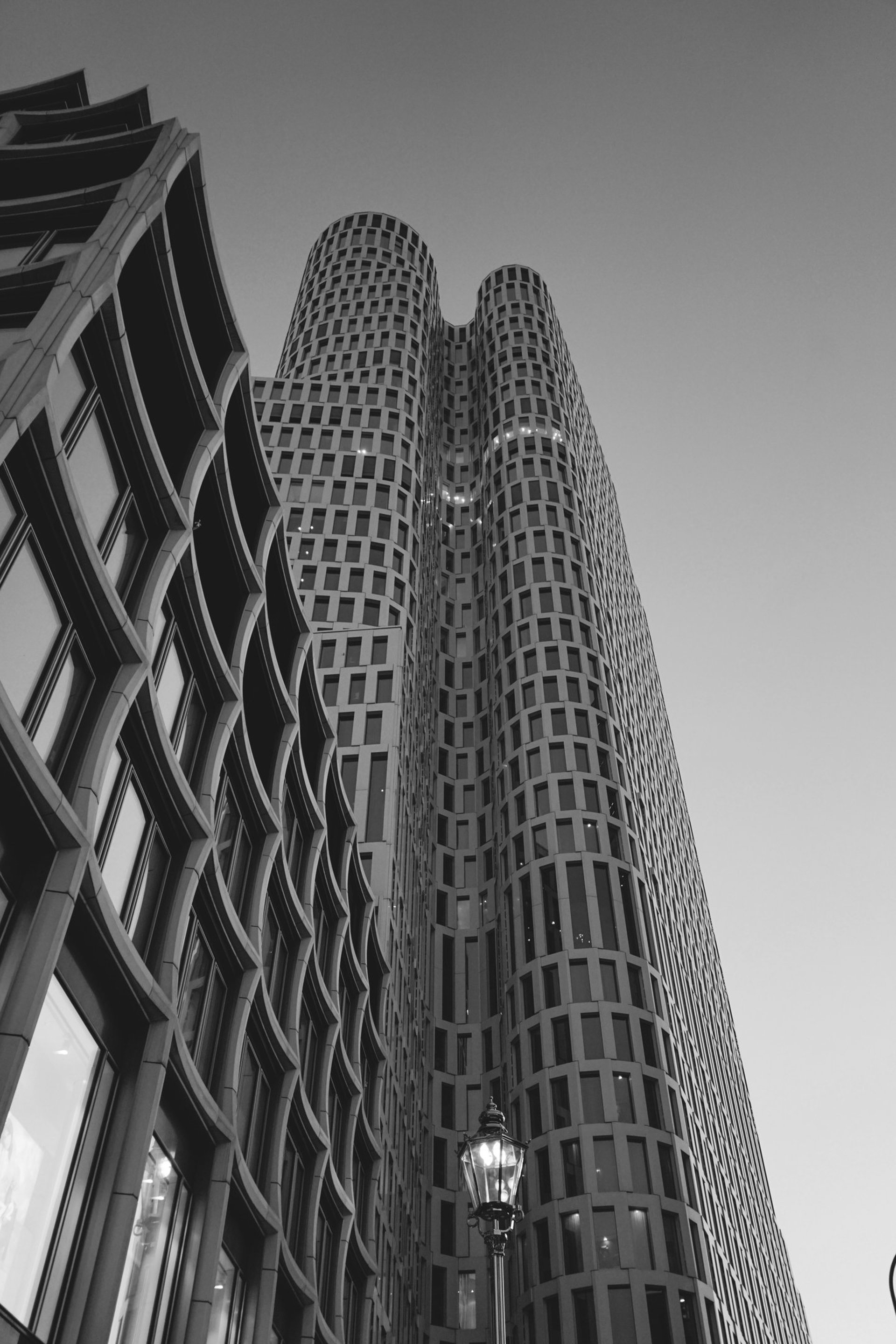 people sitting on chair near glass window during daytime