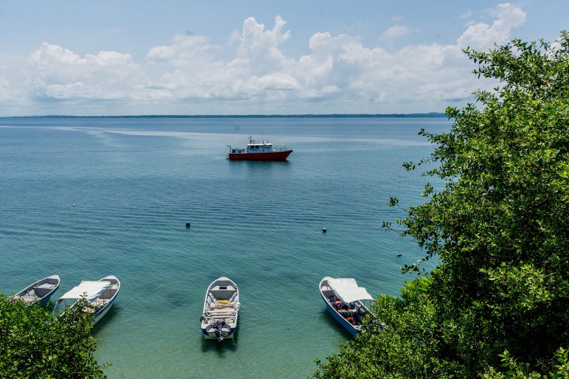 black and brown leather padded tub sofa