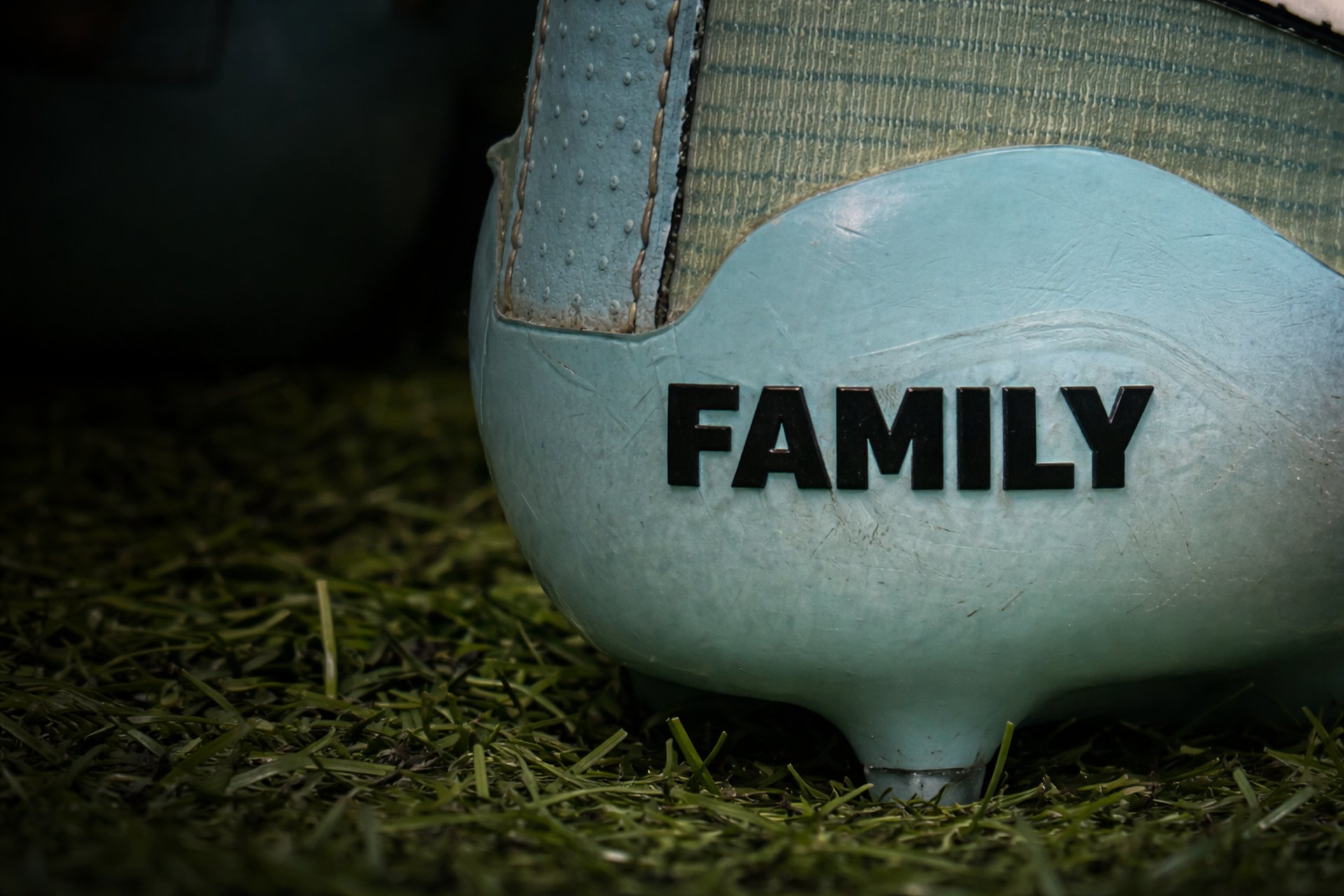red hard hat on pavement\