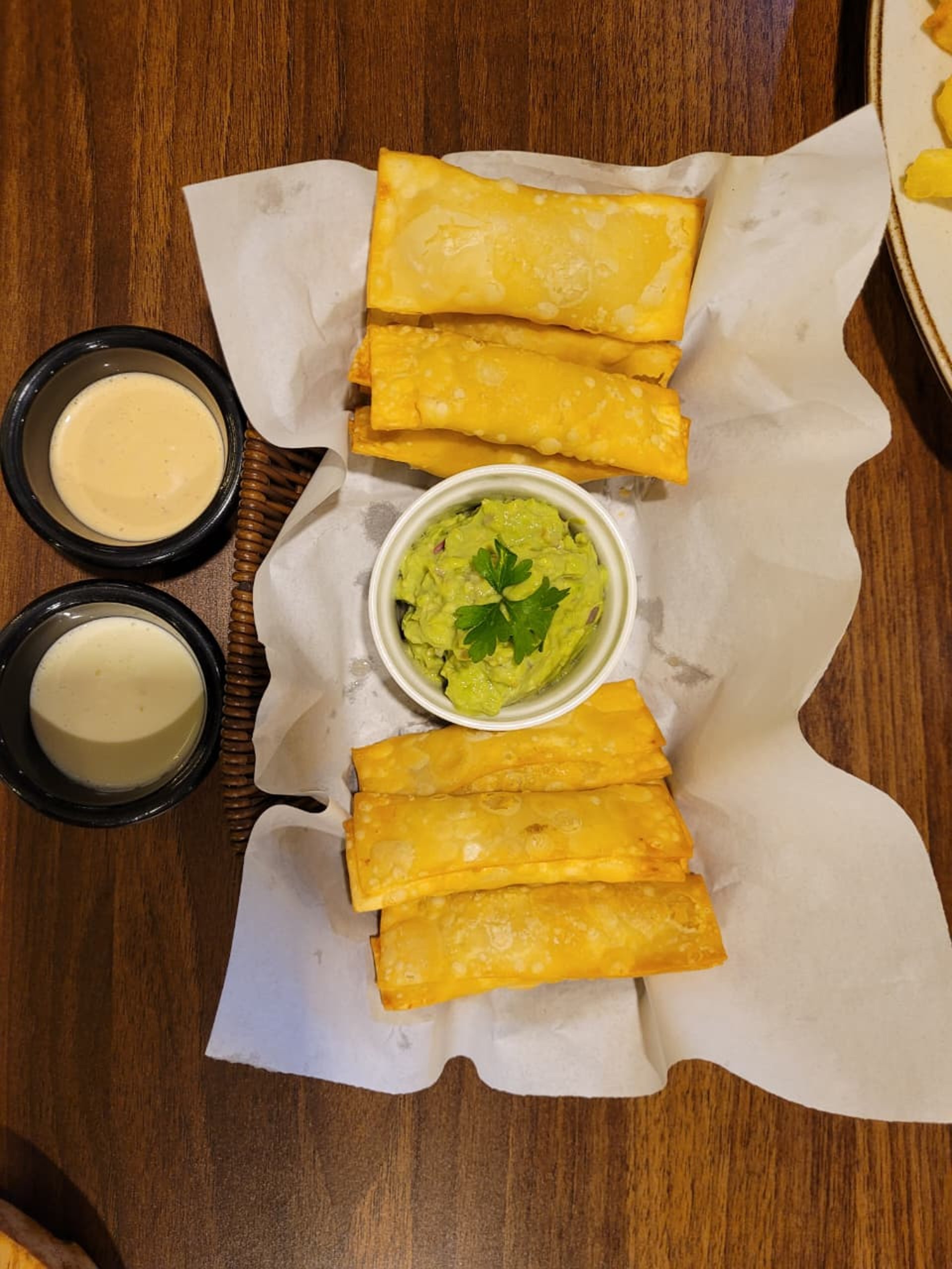 woman wearing yellow long-sleeved dress under white clouds and blue sky during daytime