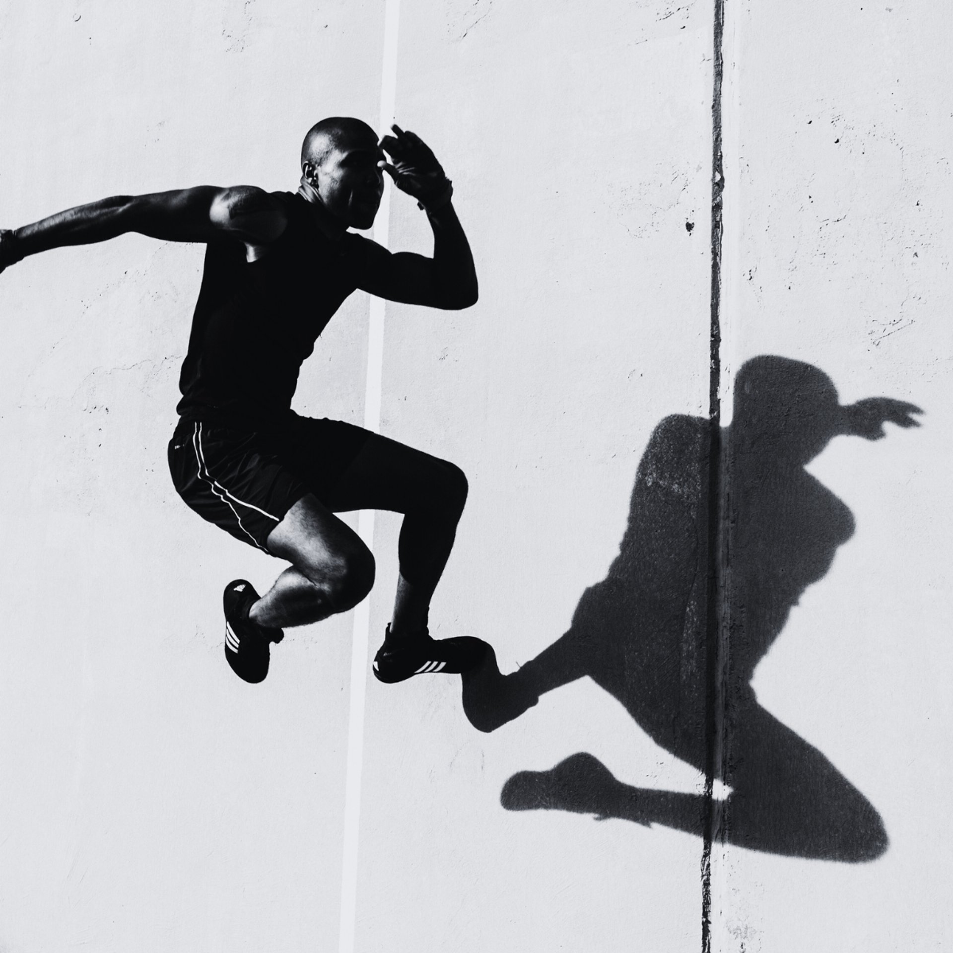 red and black bicycle on black floor