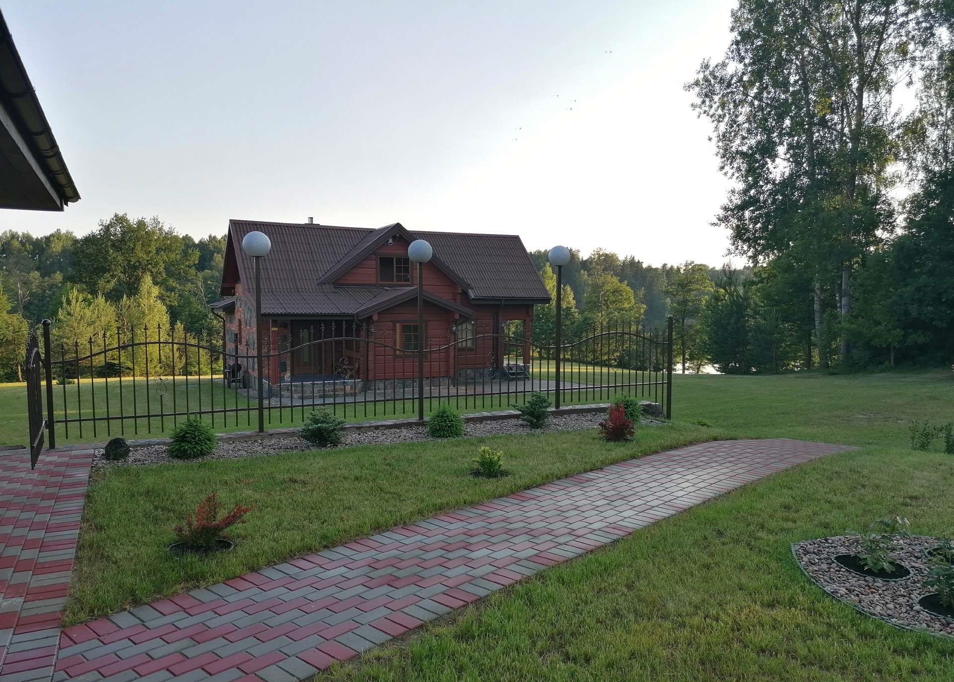 black and brown leather padded tub sofa