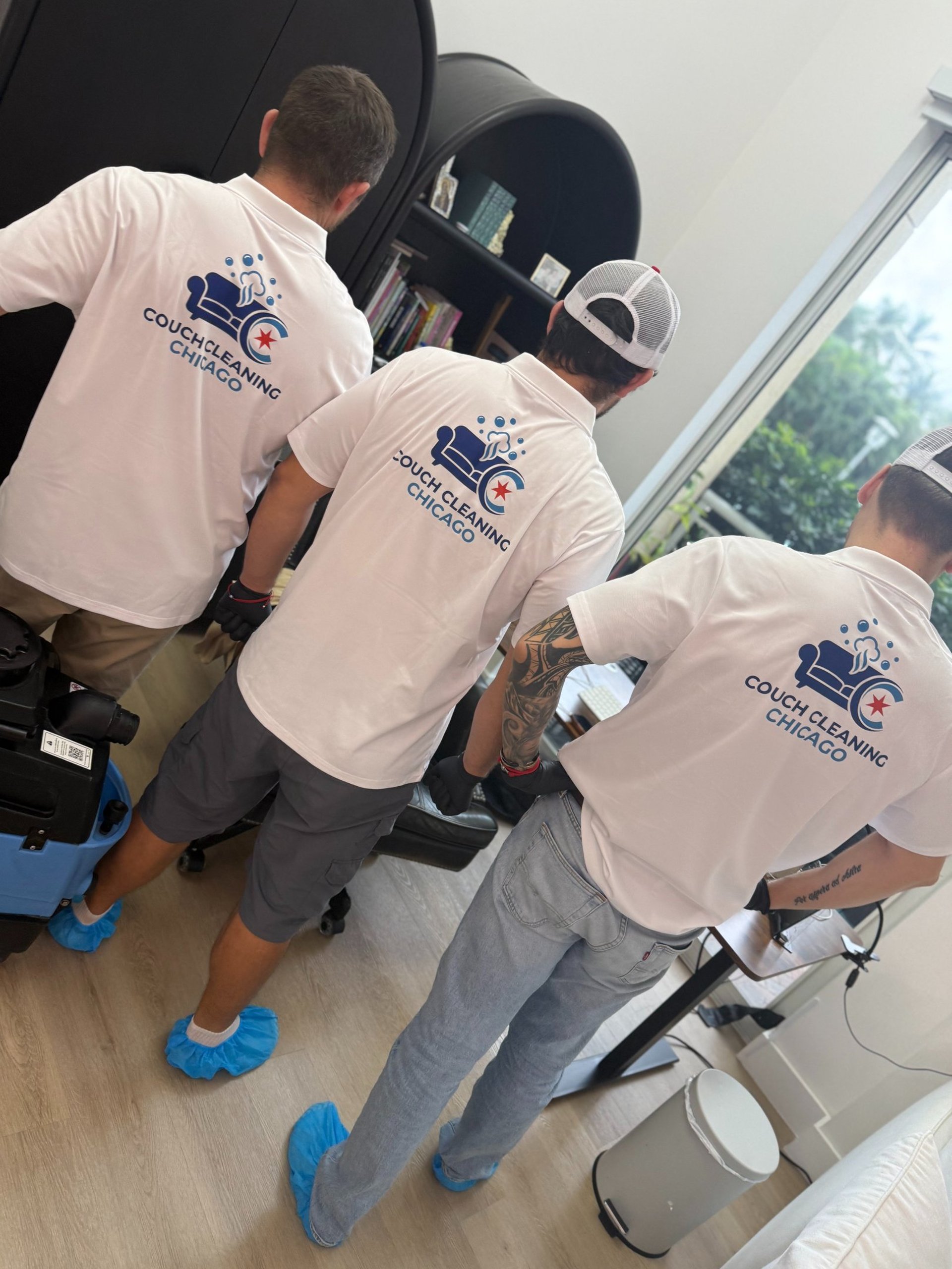 black and brown leather padded tub sofa