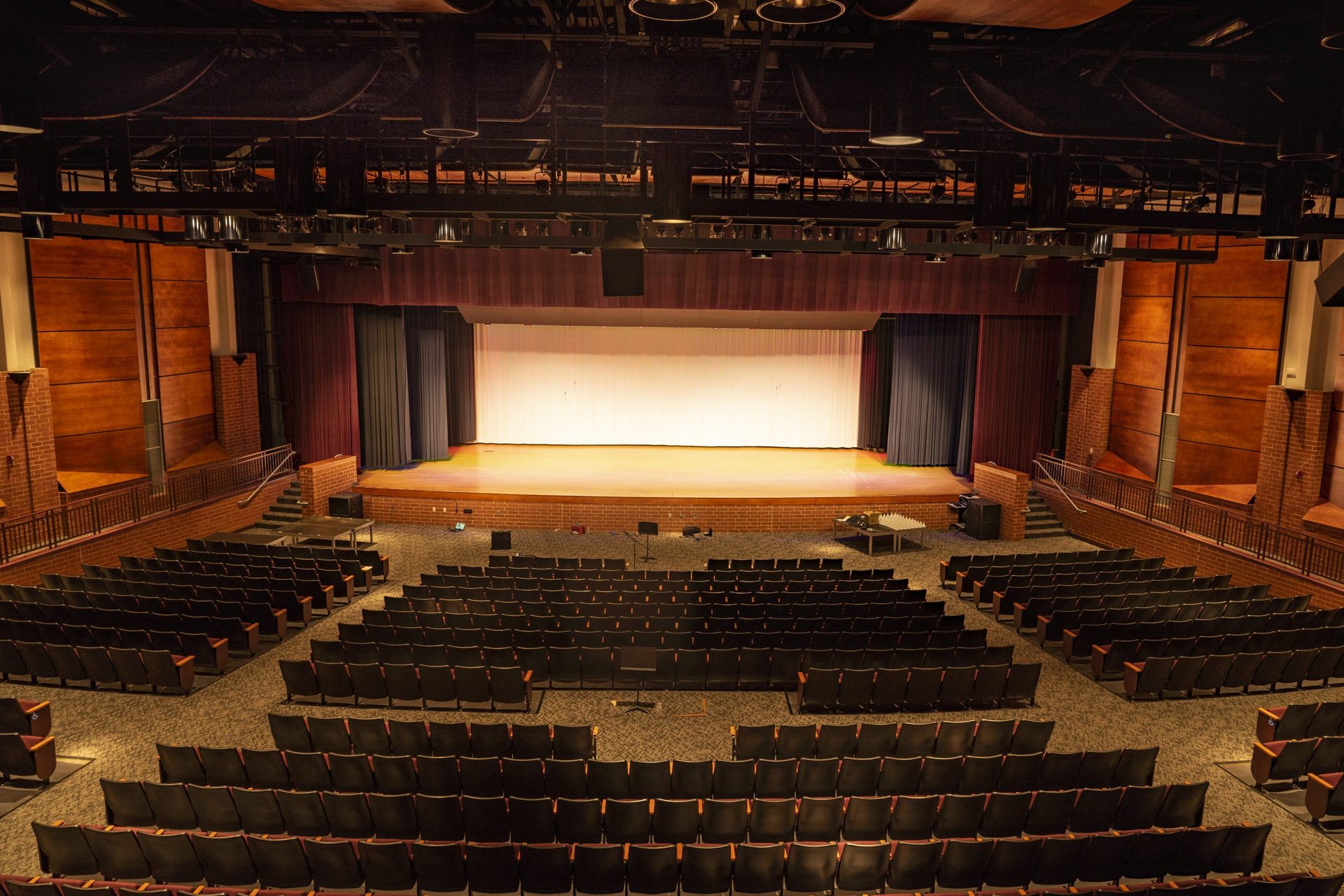 black and brown leather padded tub sofa