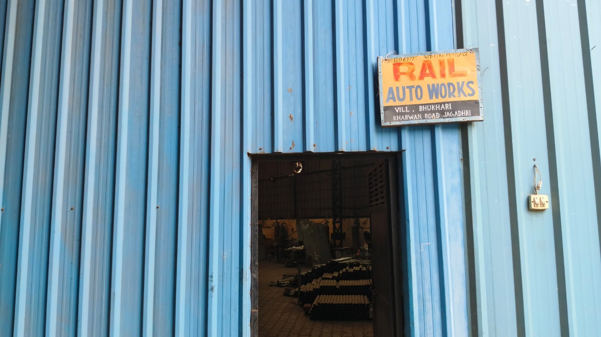 two person standing near wall