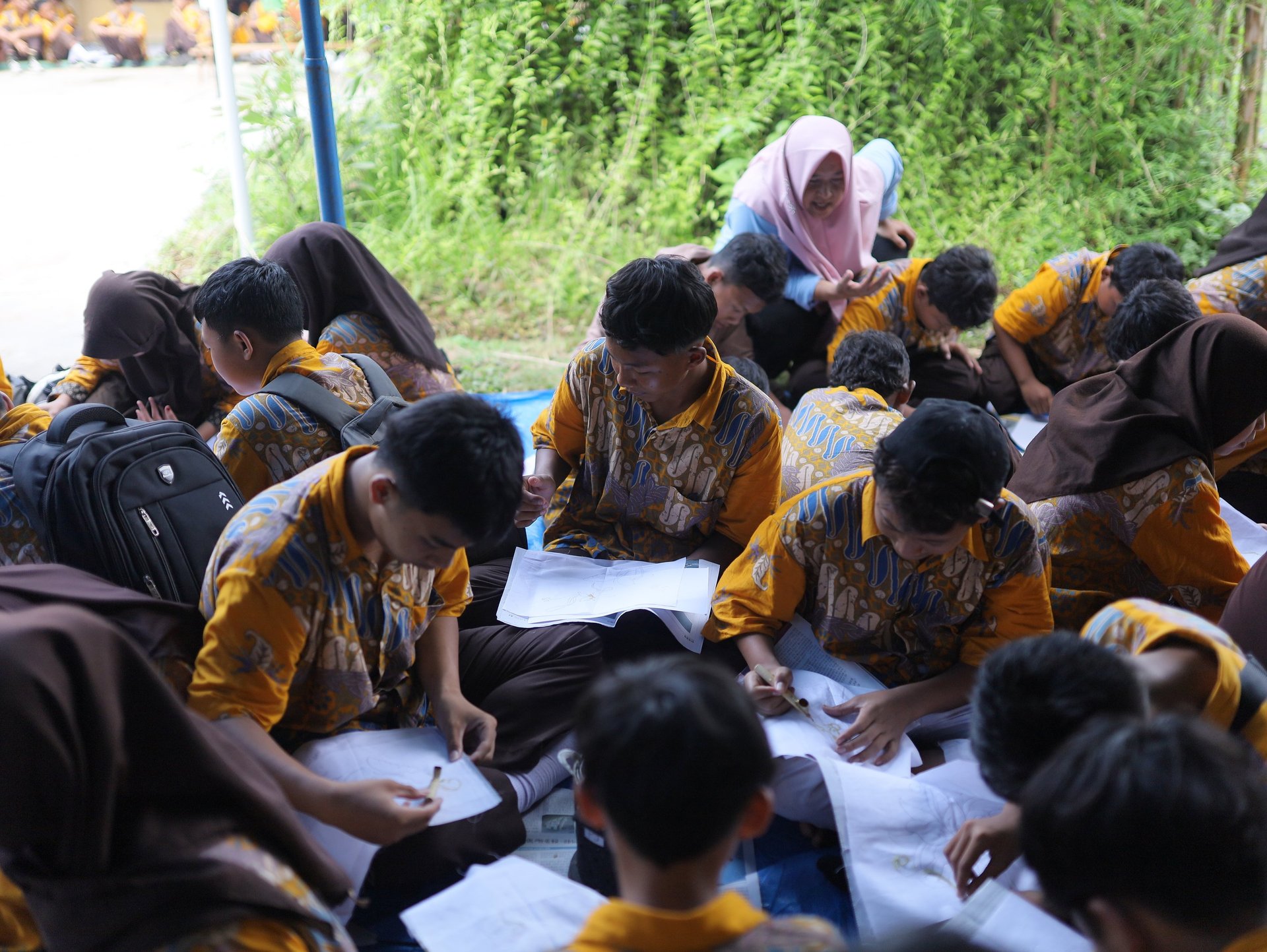 an abstract photo of a curved building with a blue sky in the background