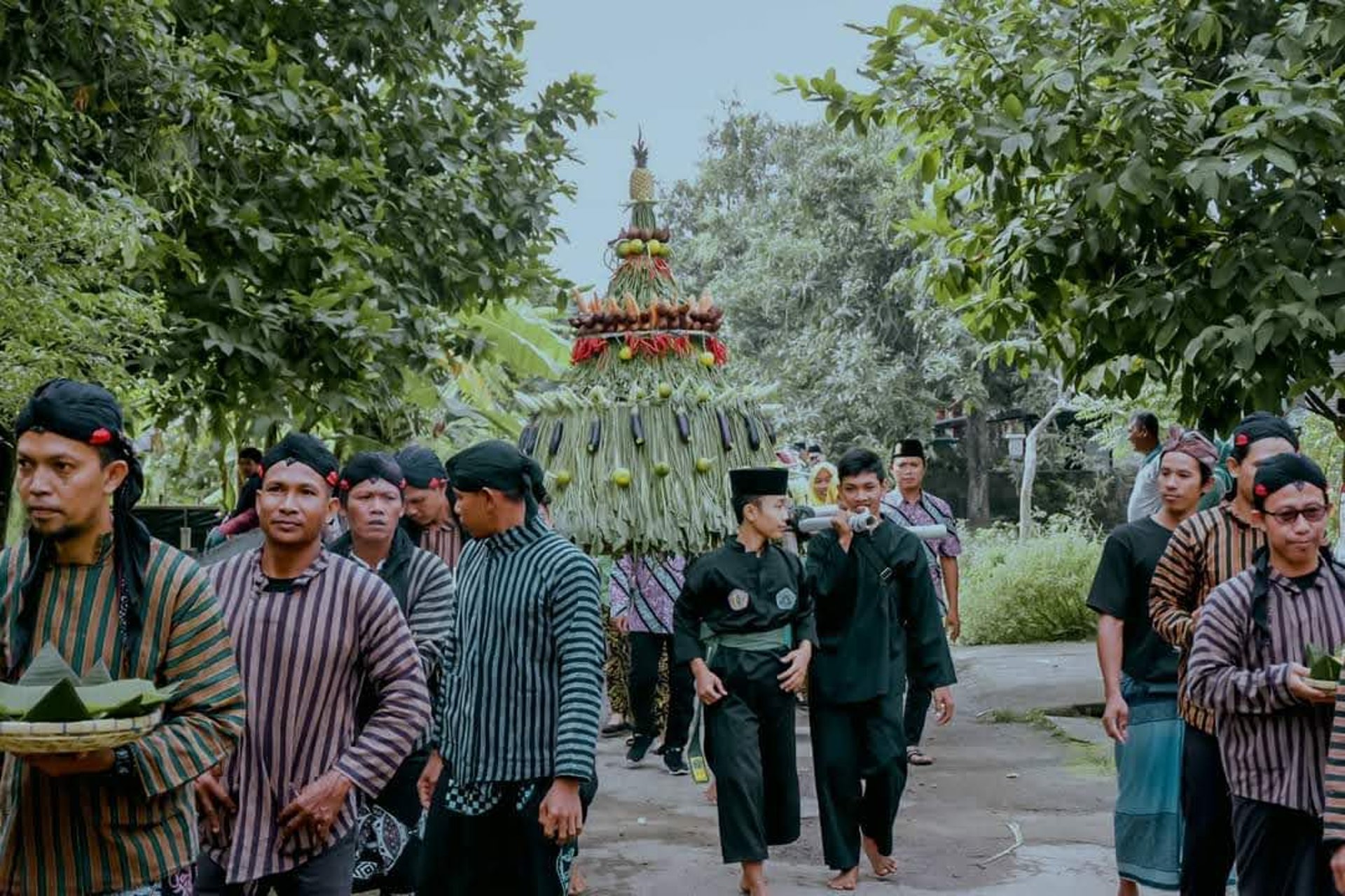 an abstract photo of a curved building with a blue sky in the background