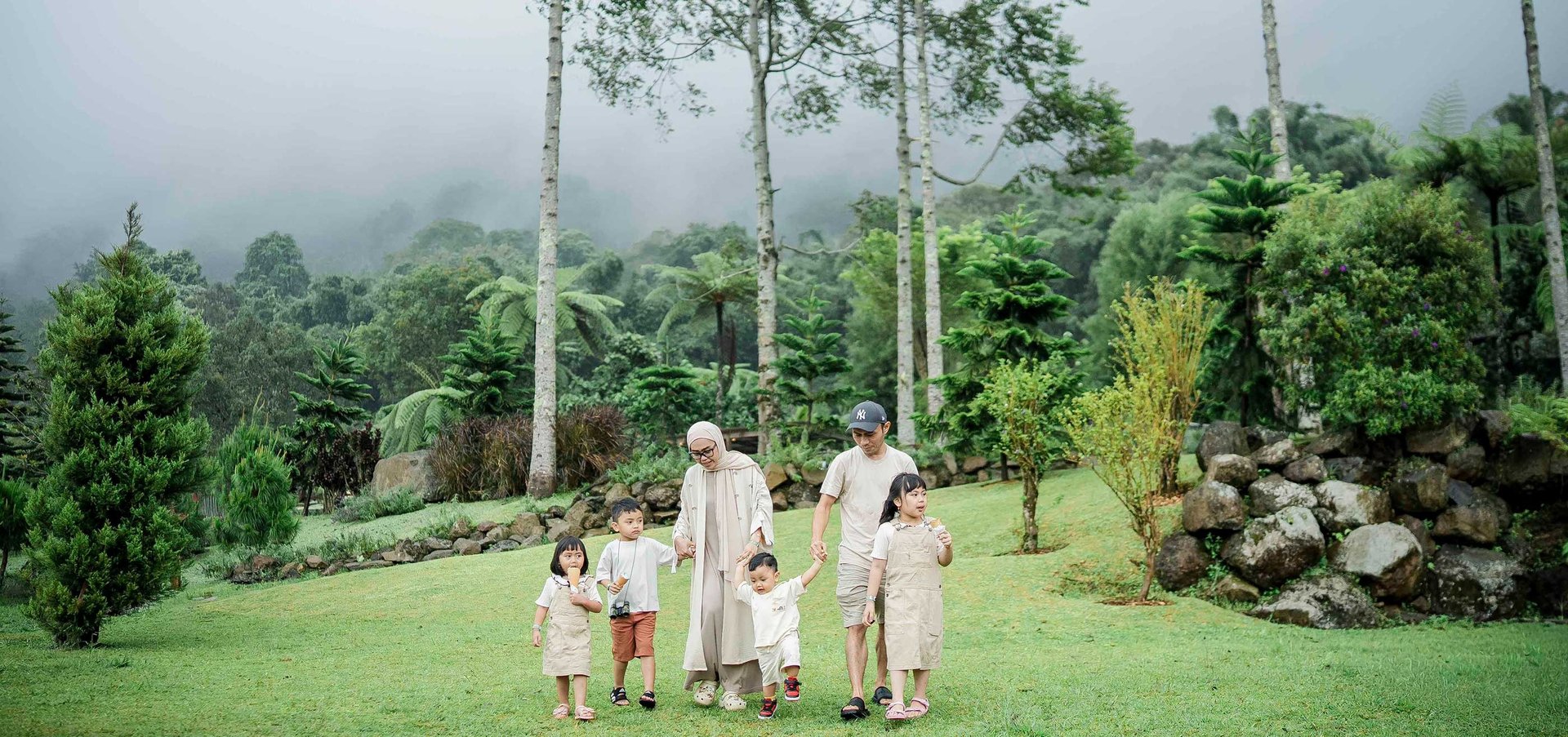 Family photography session in a lush Bali farm Bedugul Landscape, natural candid storytelling by Hansee Photography