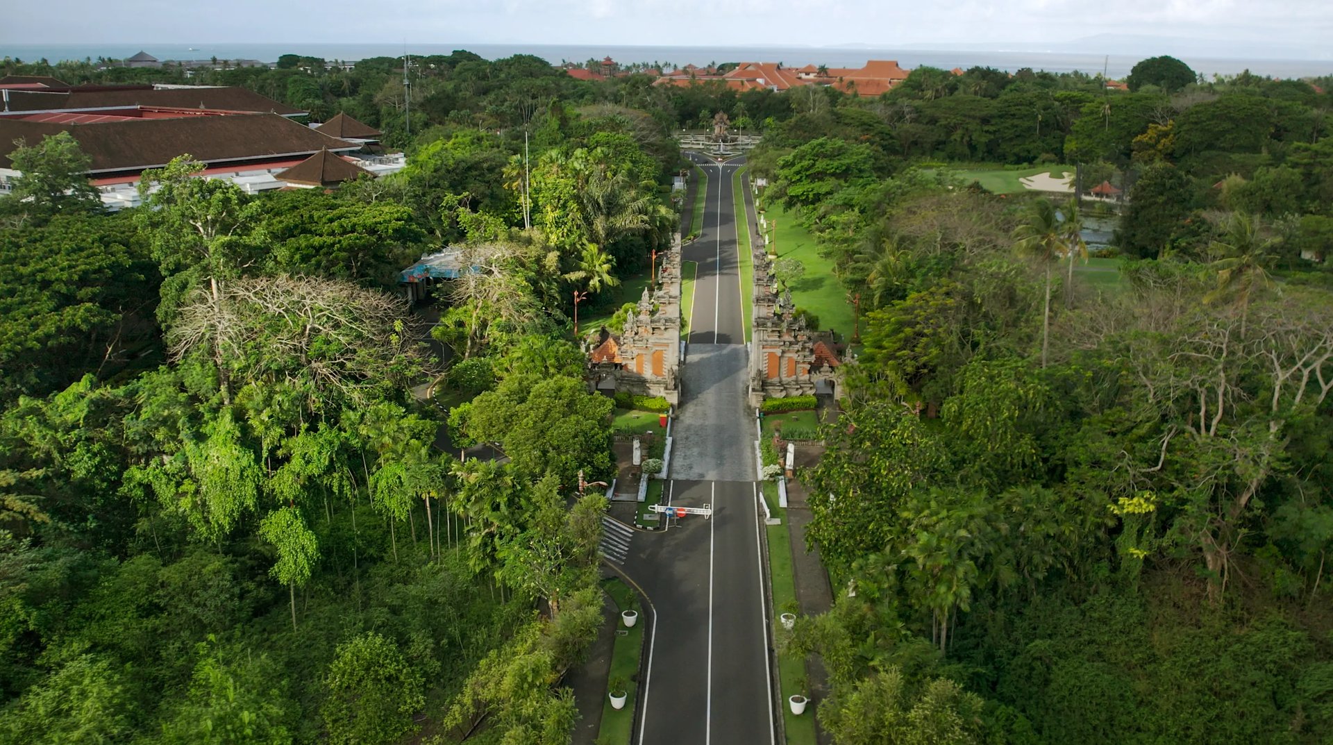 Aerial view of the main entrance to Nusa Dua Bali, home to luxury beachfront resorts and family photography locations.