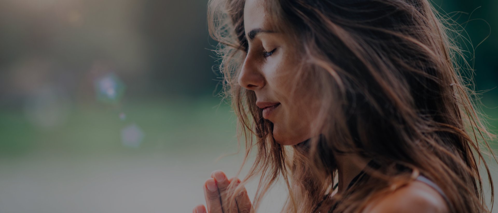 an abstract photo of a curved building with a blue sky in the background