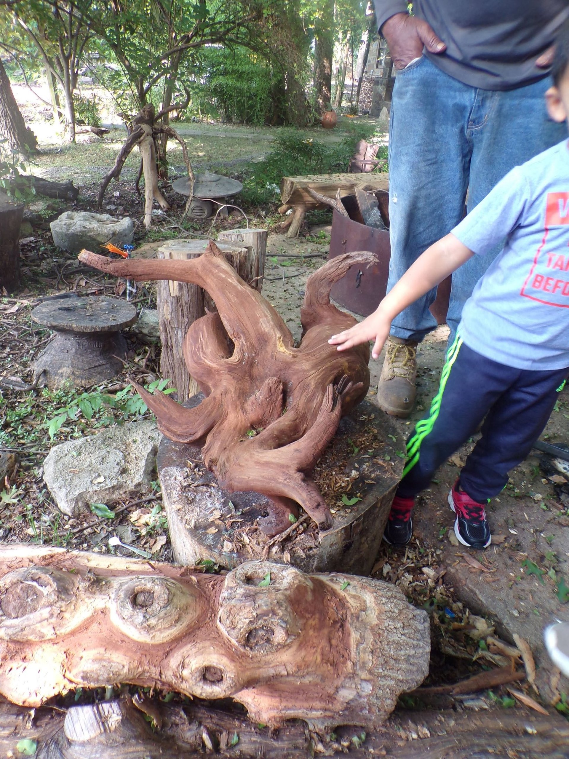 woman wearing yellow long-sleeved dress under white clouds and blue sky during daytime