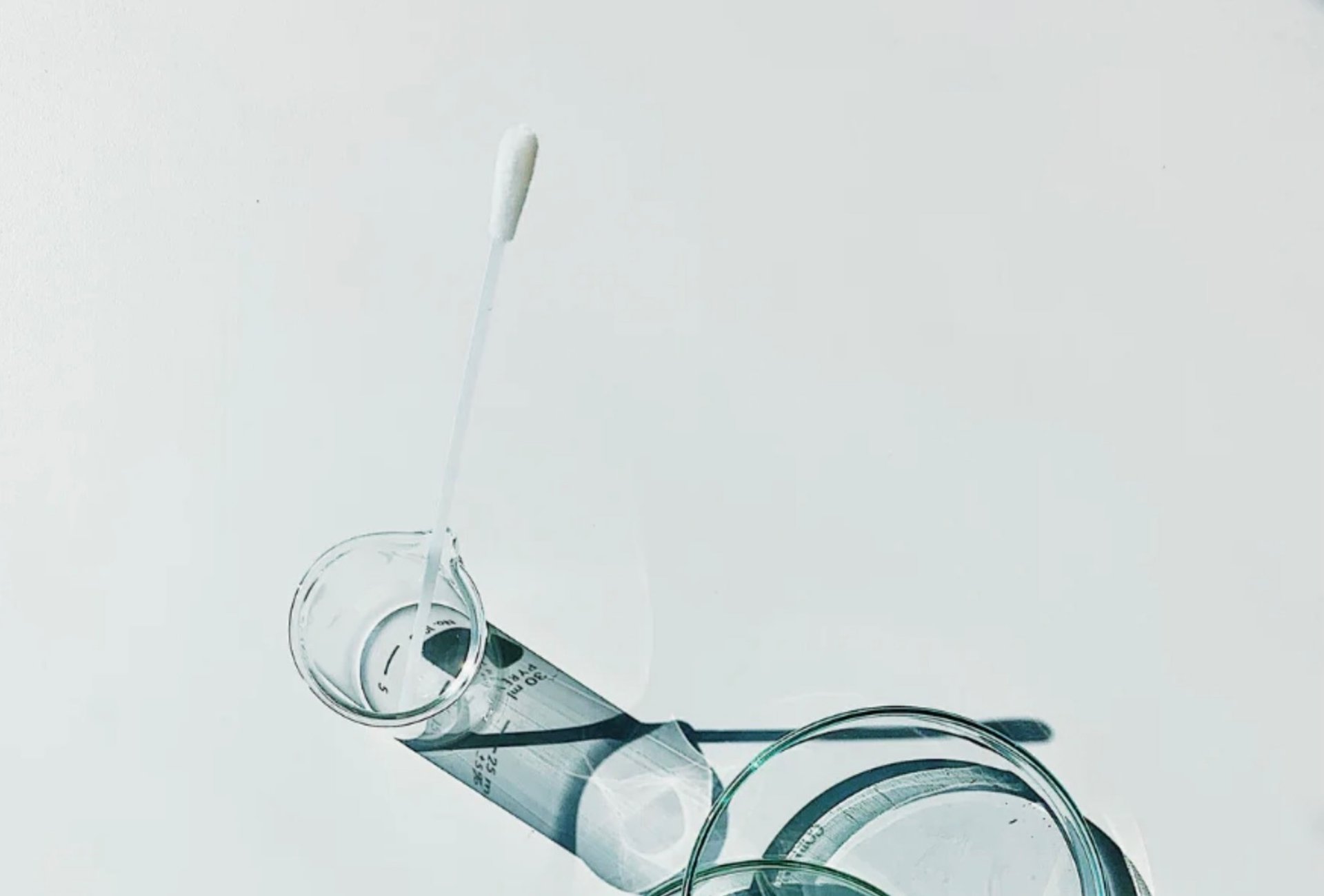 an abstract photo of a curved building with a blue sky in the background