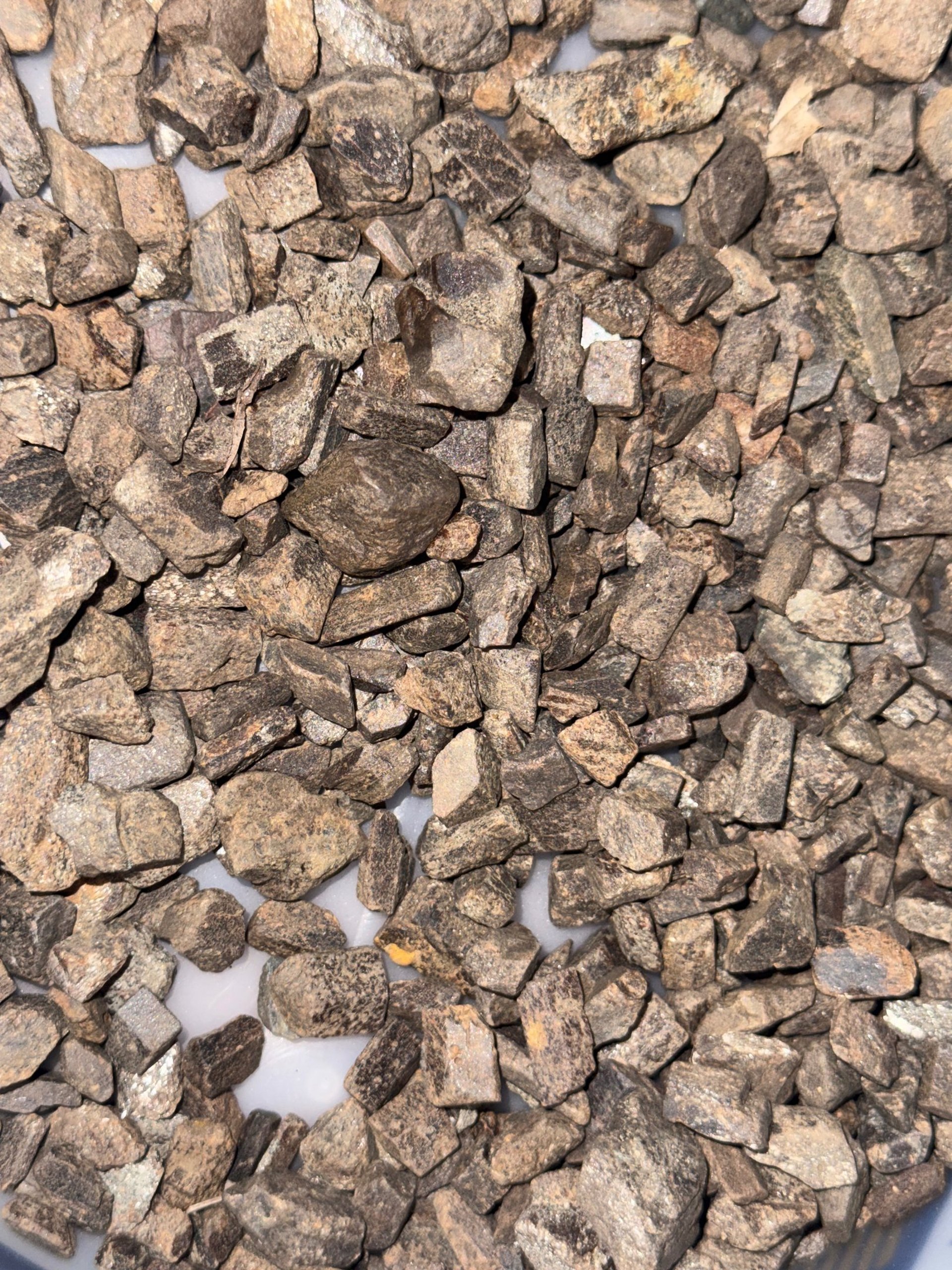 person wearing grey knit sweater