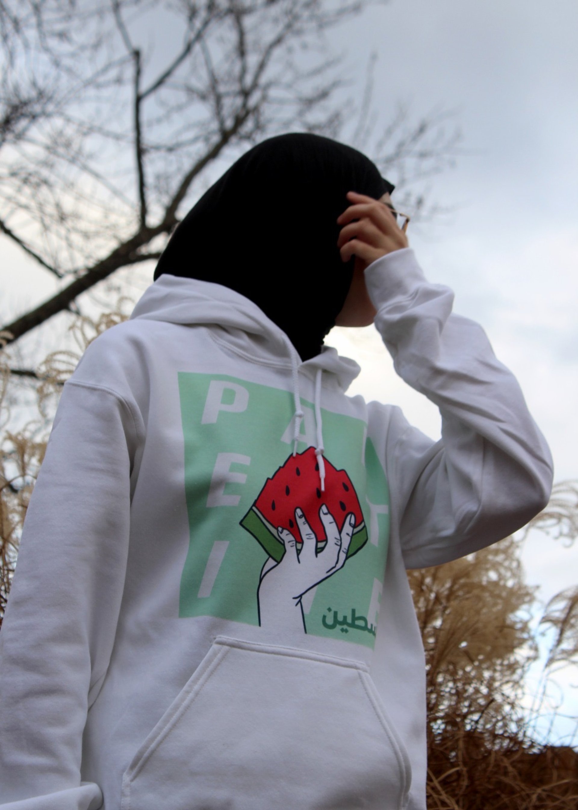 an abstract photo of a curved building with a blue sky in the background