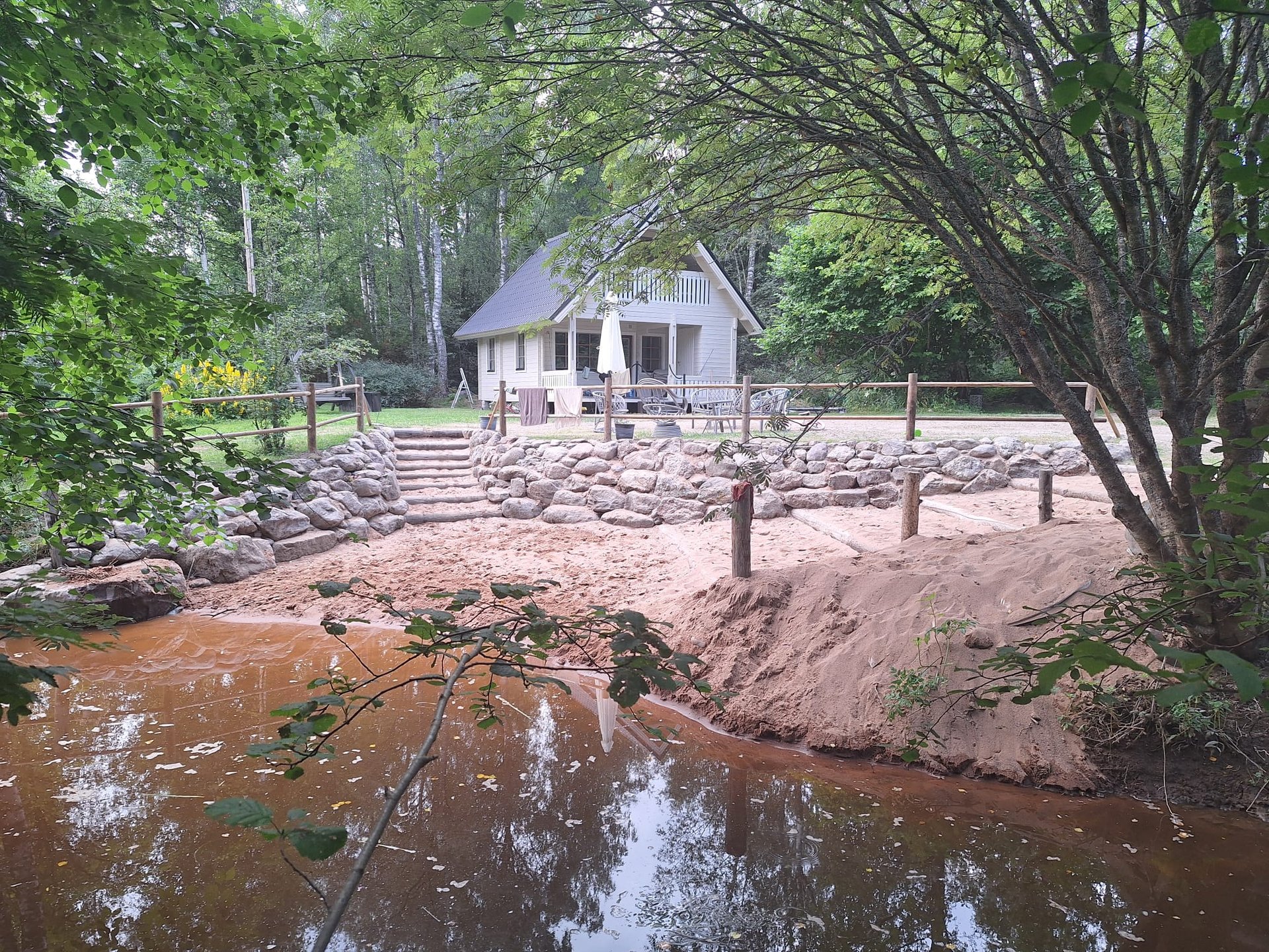 woman wearing yellow long-sleeved dress under white clouds and blue sky during daytime