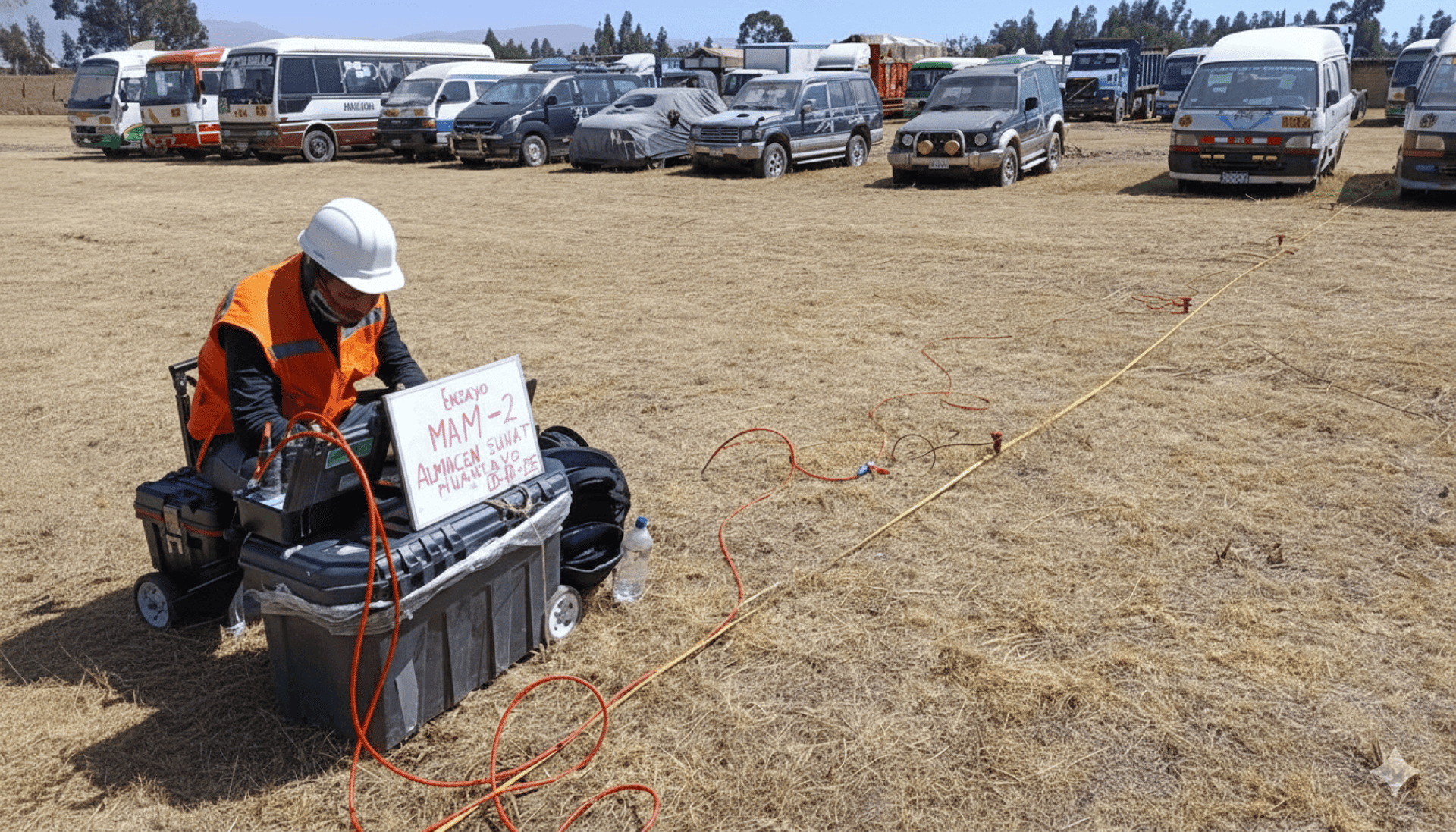 gray tripod on brown rock