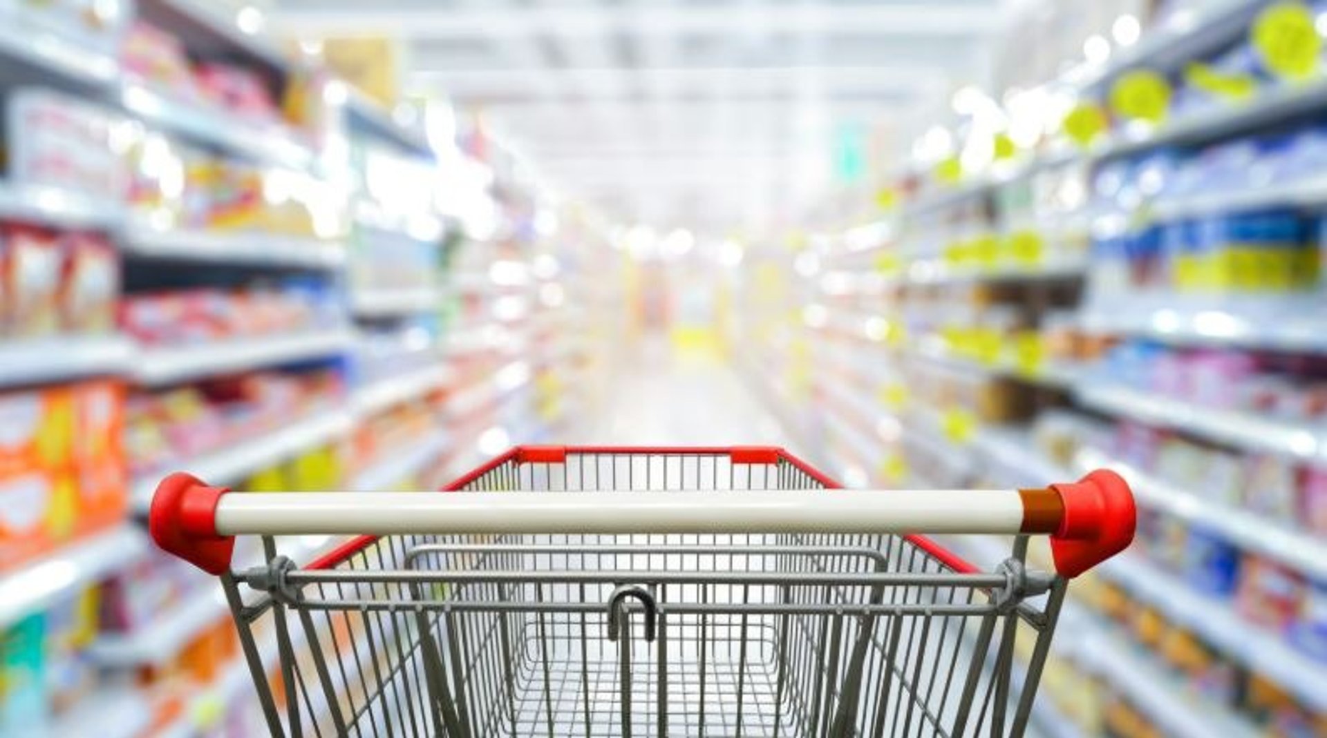a purple background with a basket of items and a target
