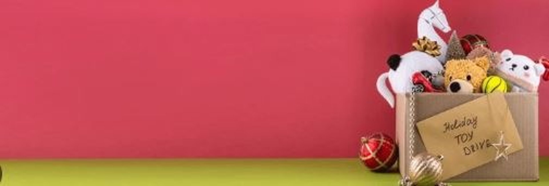 a purple background with a basket of items and a target