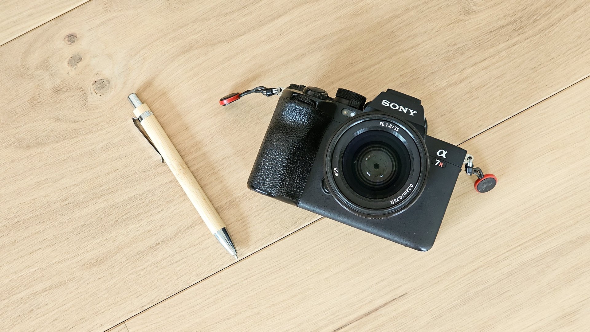black nikon dslr camera on white printer paper