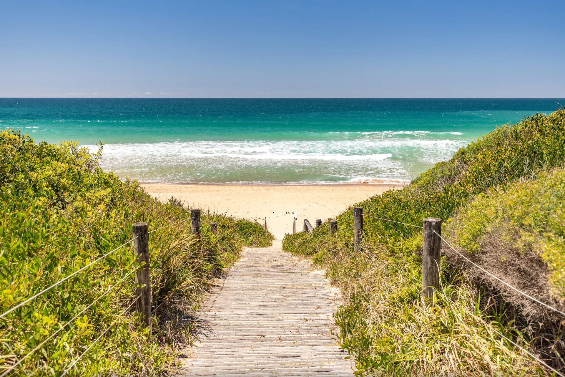 black and brown leather padded tub sofa