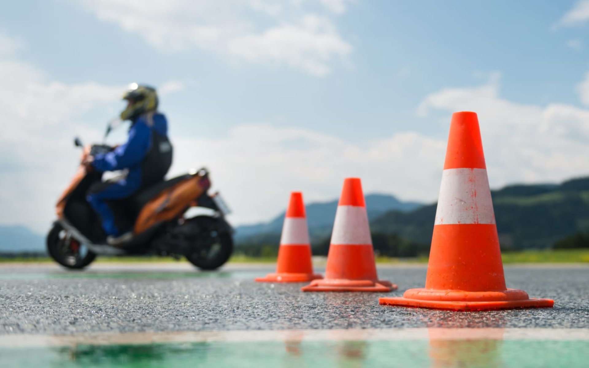 man on black cruiser motorcycle in highway
