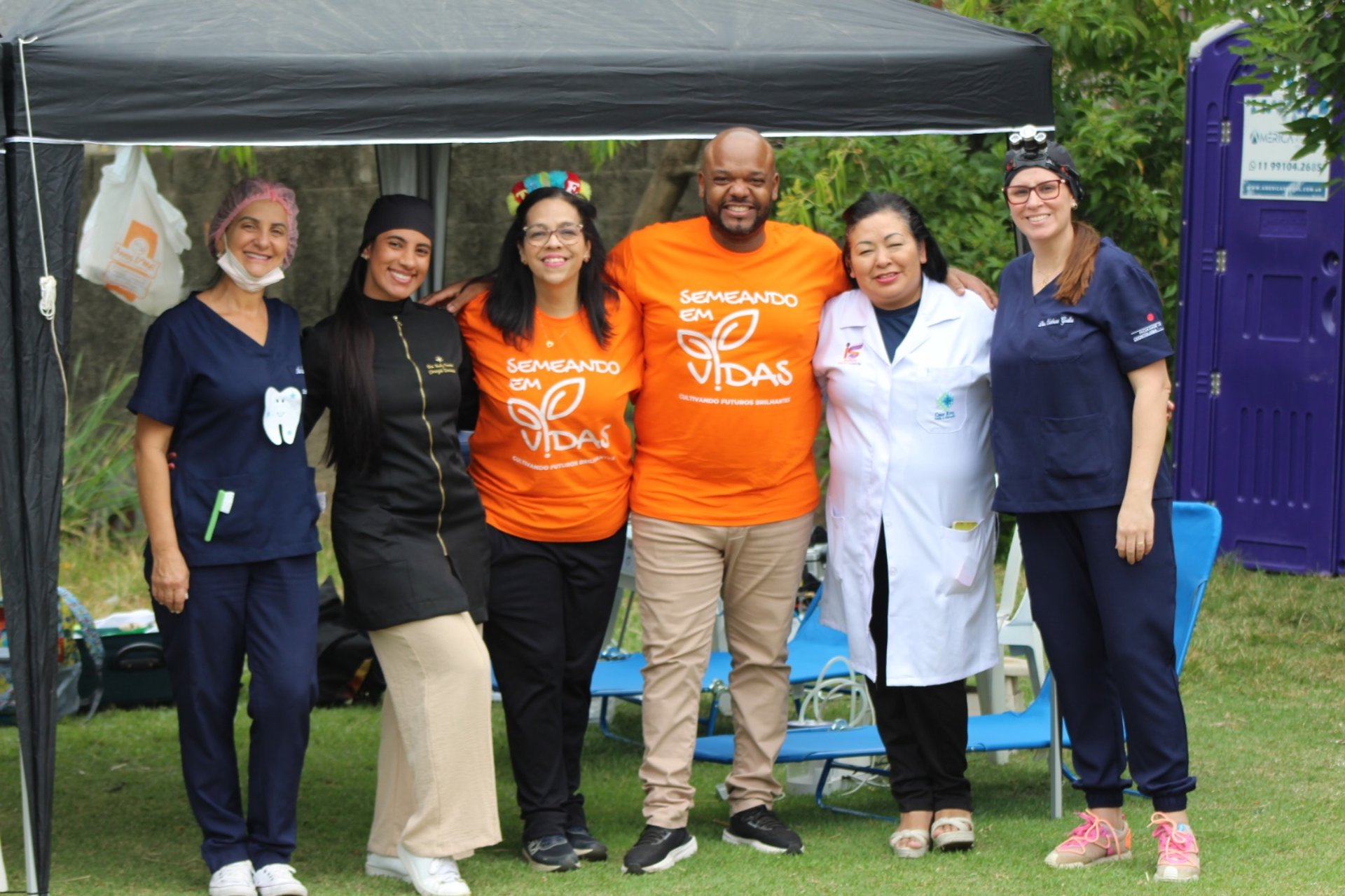 girl in white t-shirt sitting on red chair
