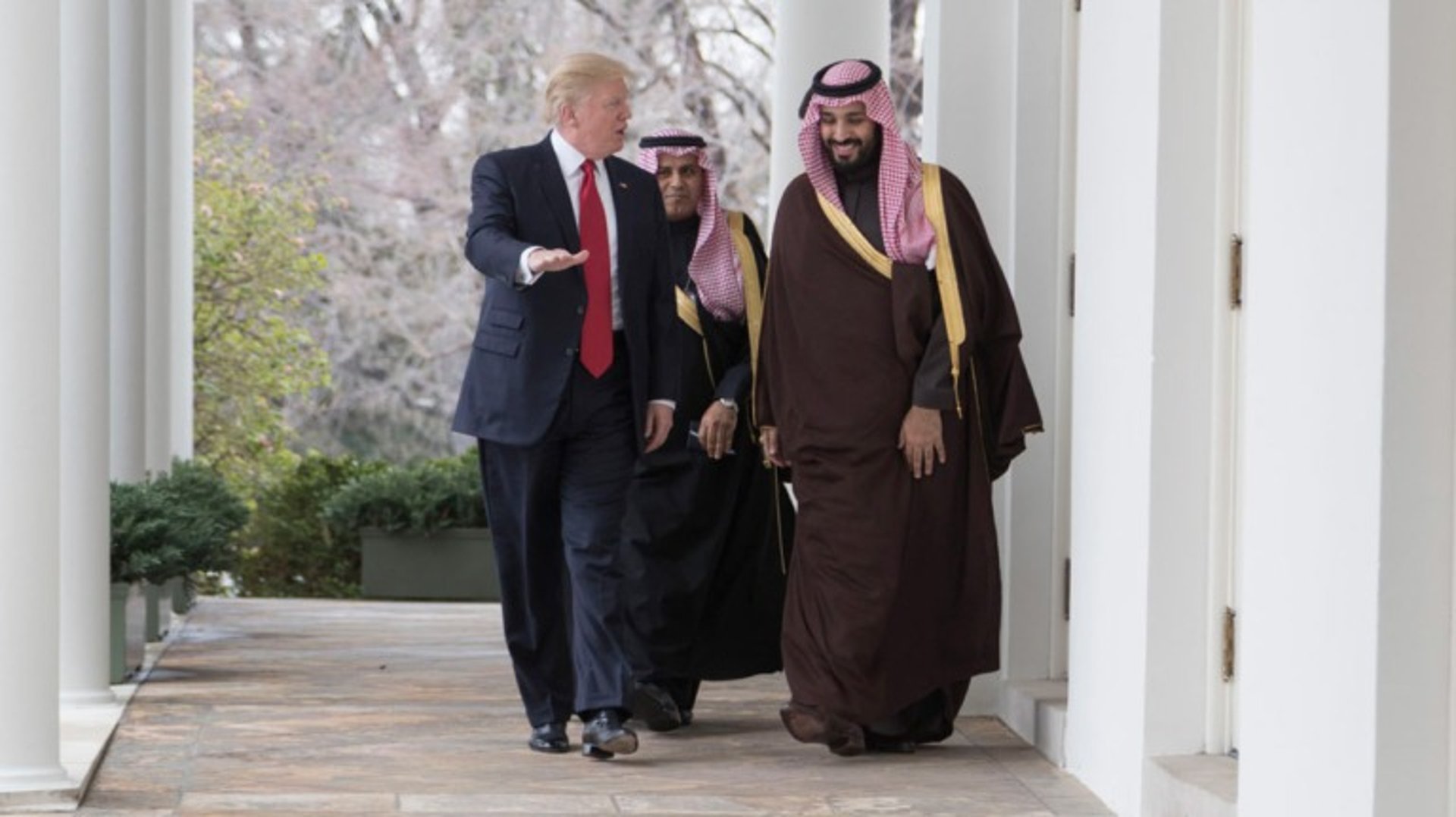 a bitcoin sitting on top of a pile of money