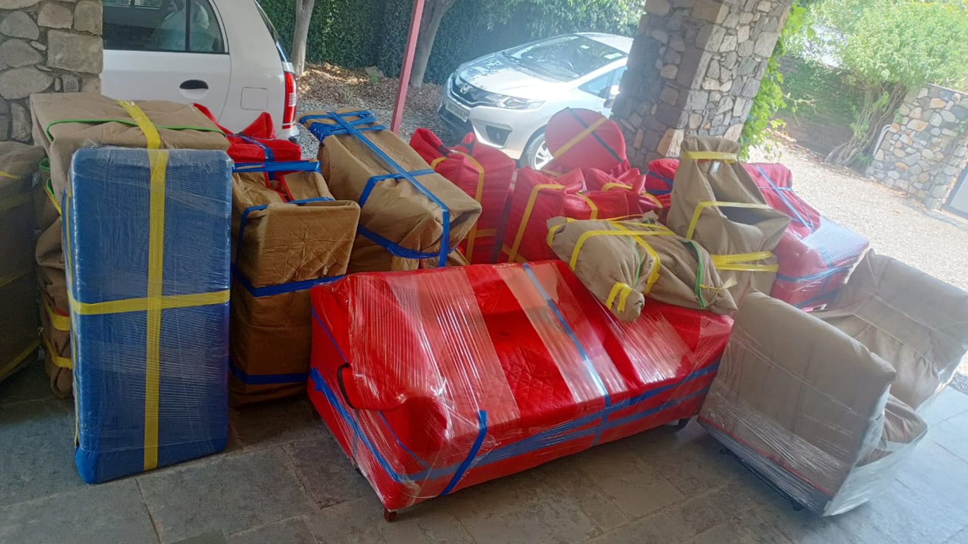 an abstract photo of a curved building with a blue sky in the background