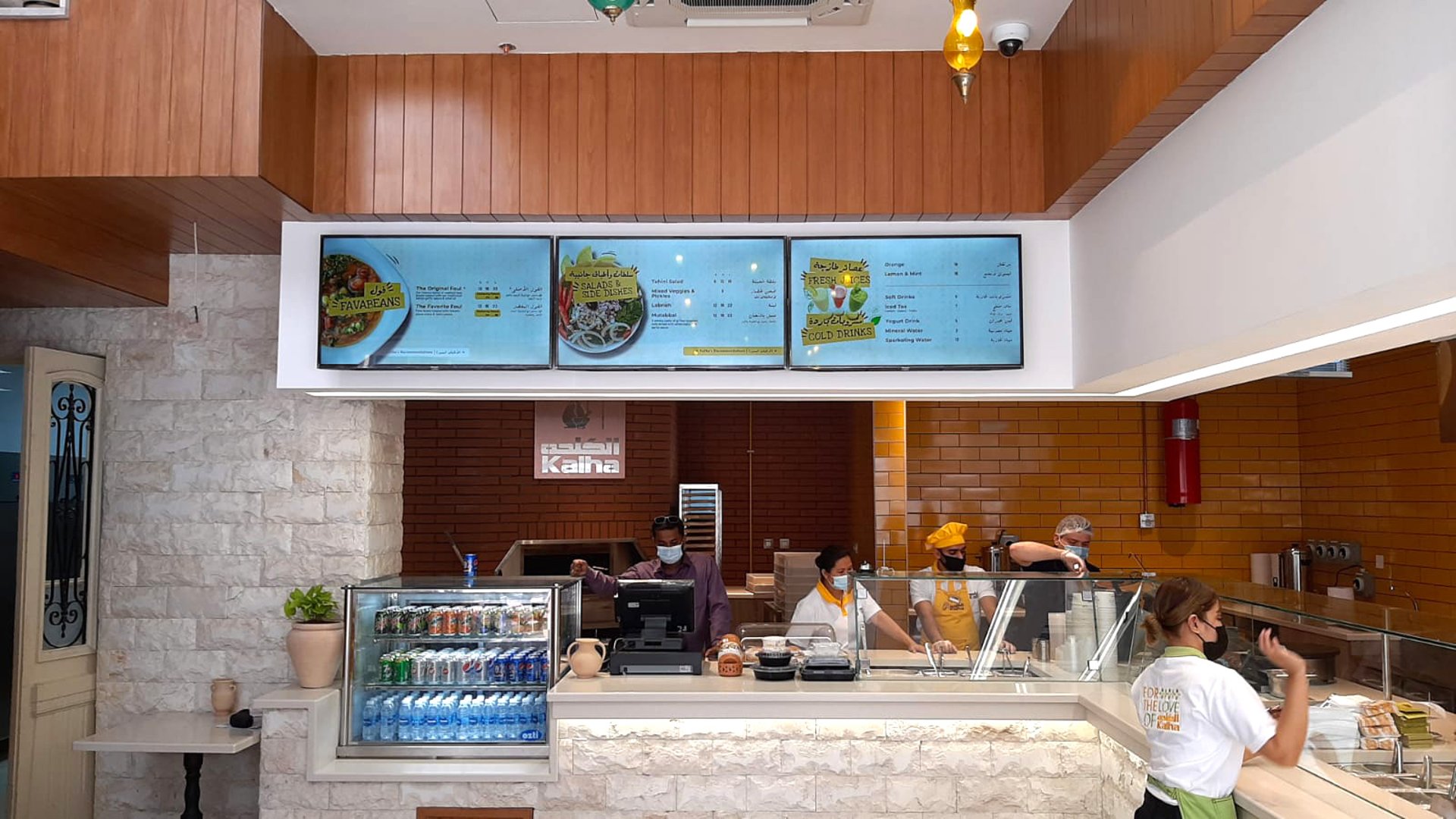 an abstract photo of a curved building with a blue sky in the background