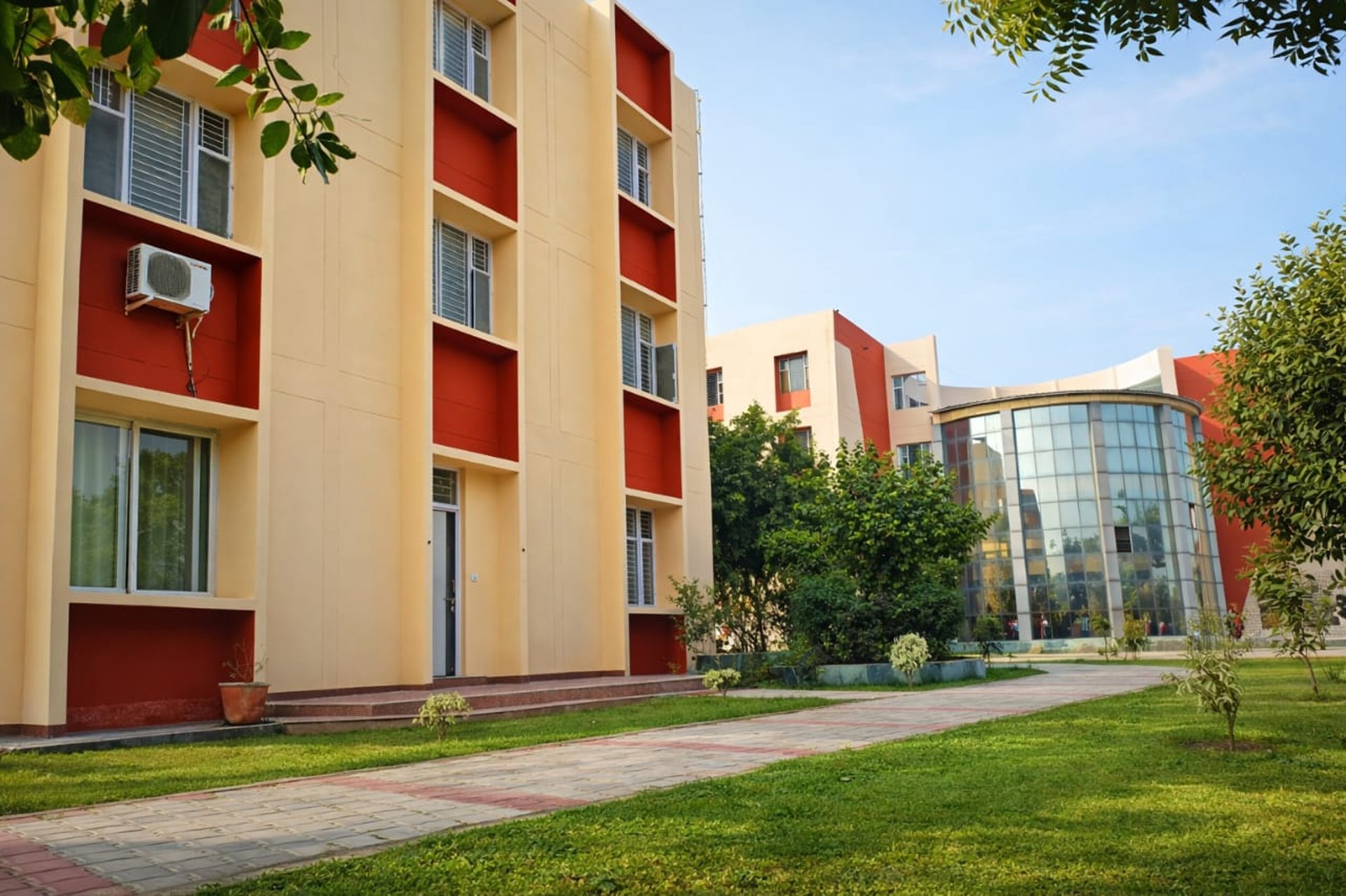 woman wearing yellow long-sleeved dress under white clouds and blue sky during daytime