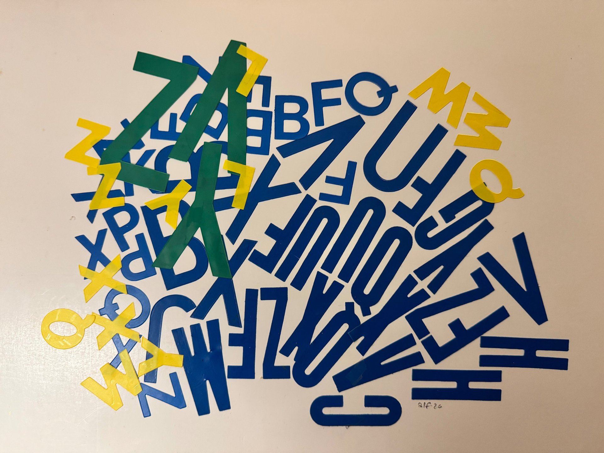 an abstract photo of a curved building with a blue sky in the background