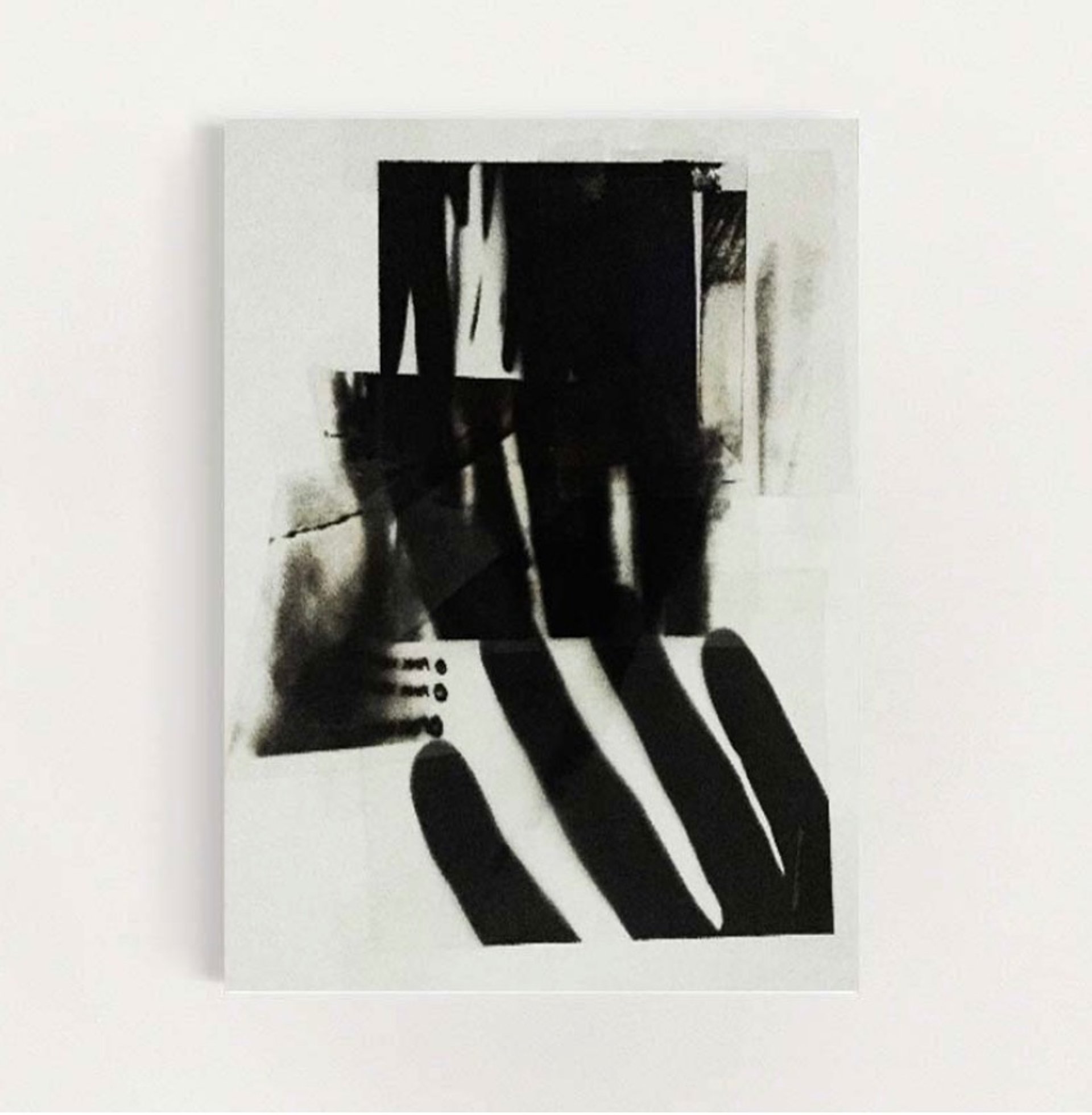 an abstract photo of a curved building with a blue sky in the background