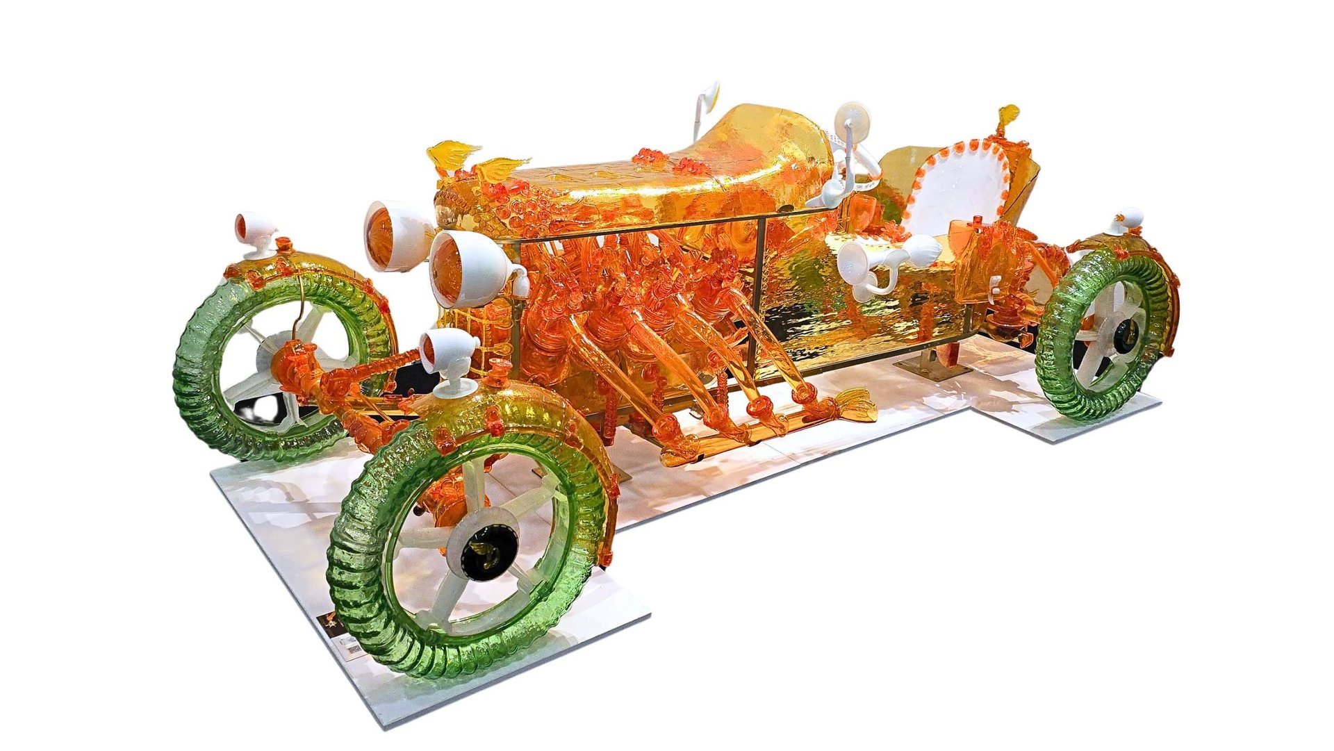 an abstract photo of a curved building with a blue sky in the background