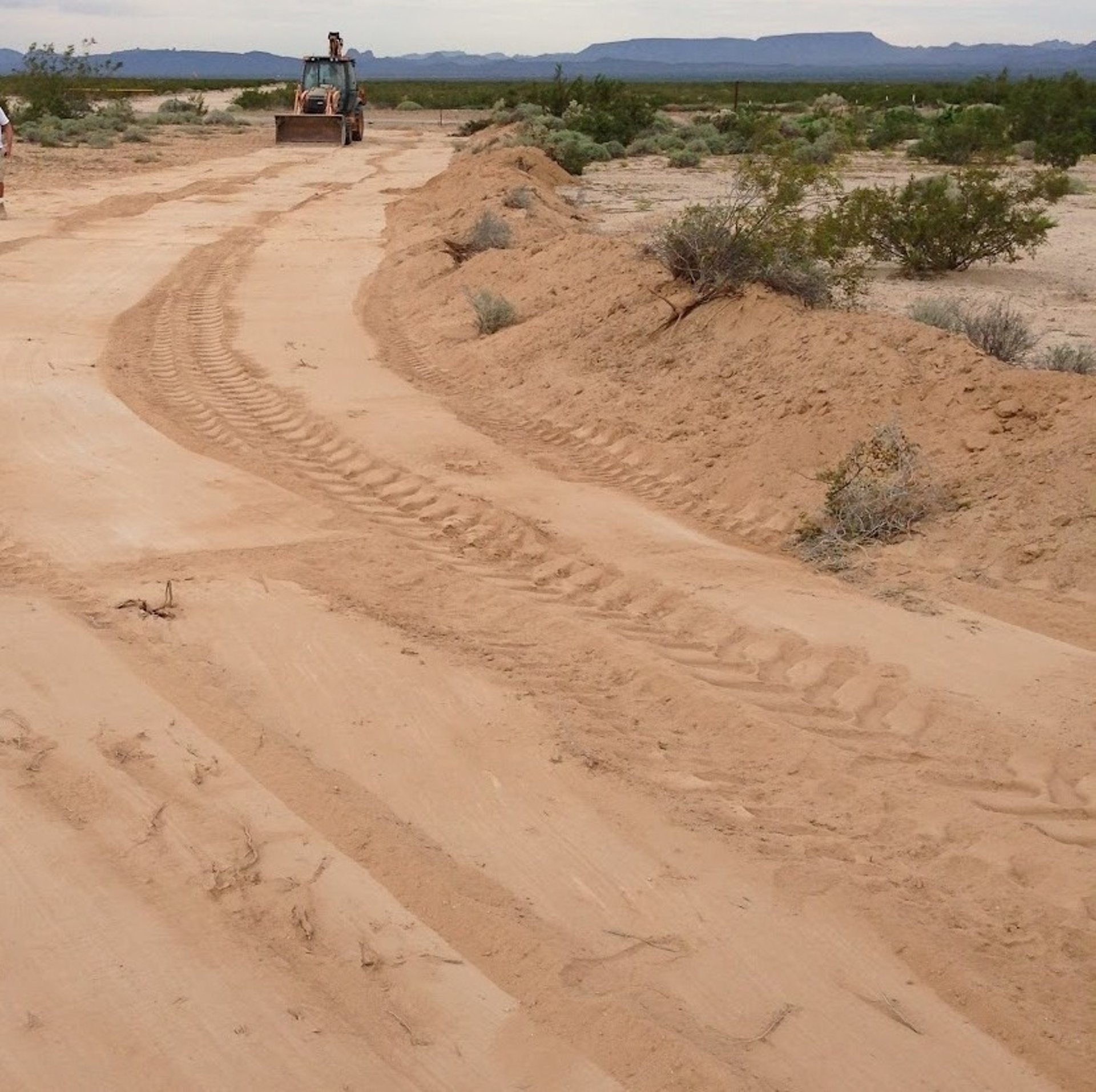 black and brown leather padded tub sofa