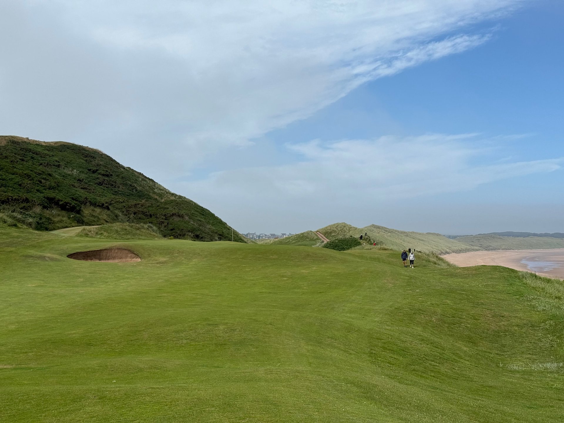 black and brown leather padded tub sofa