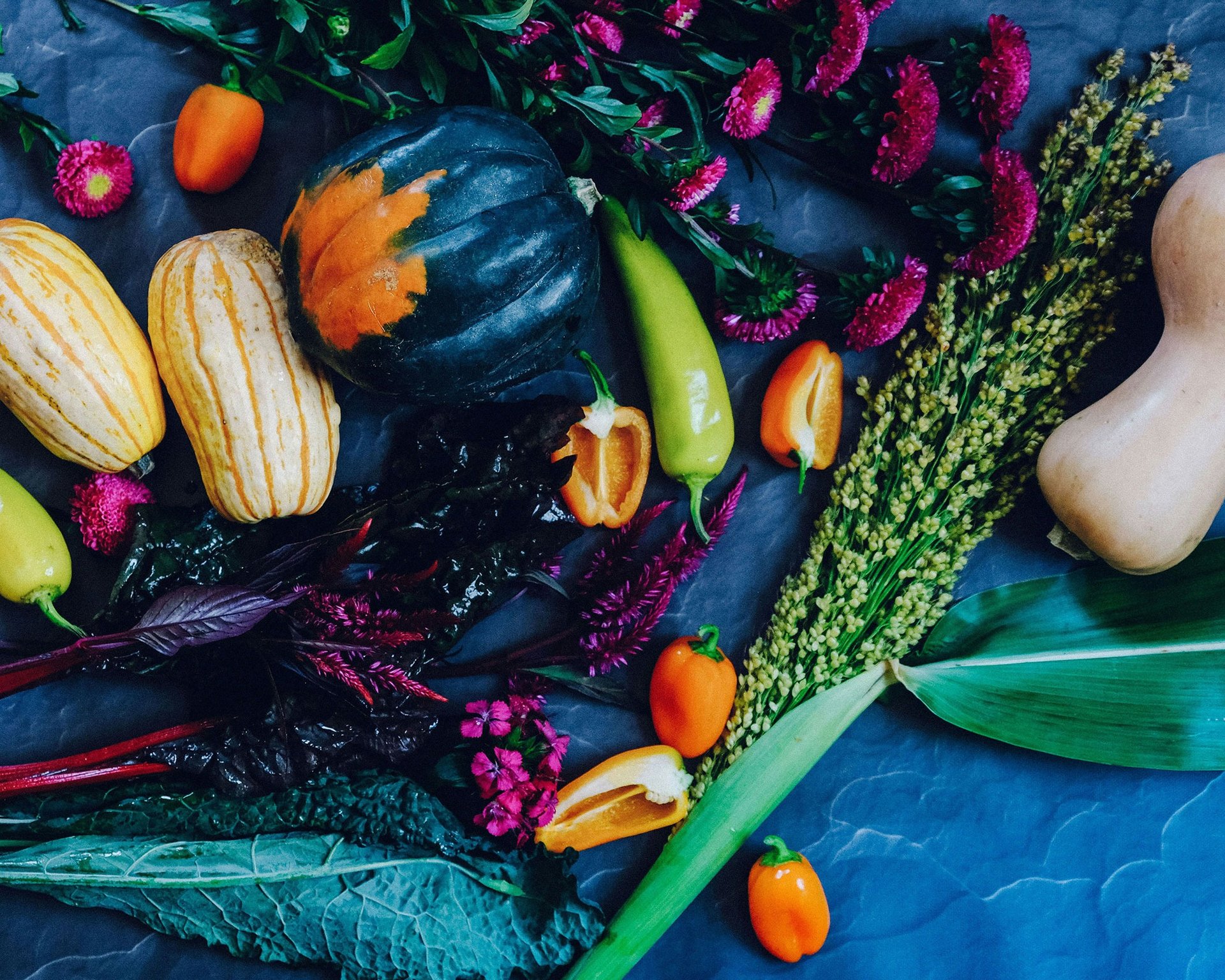 sliced pomegranate fruits on black table