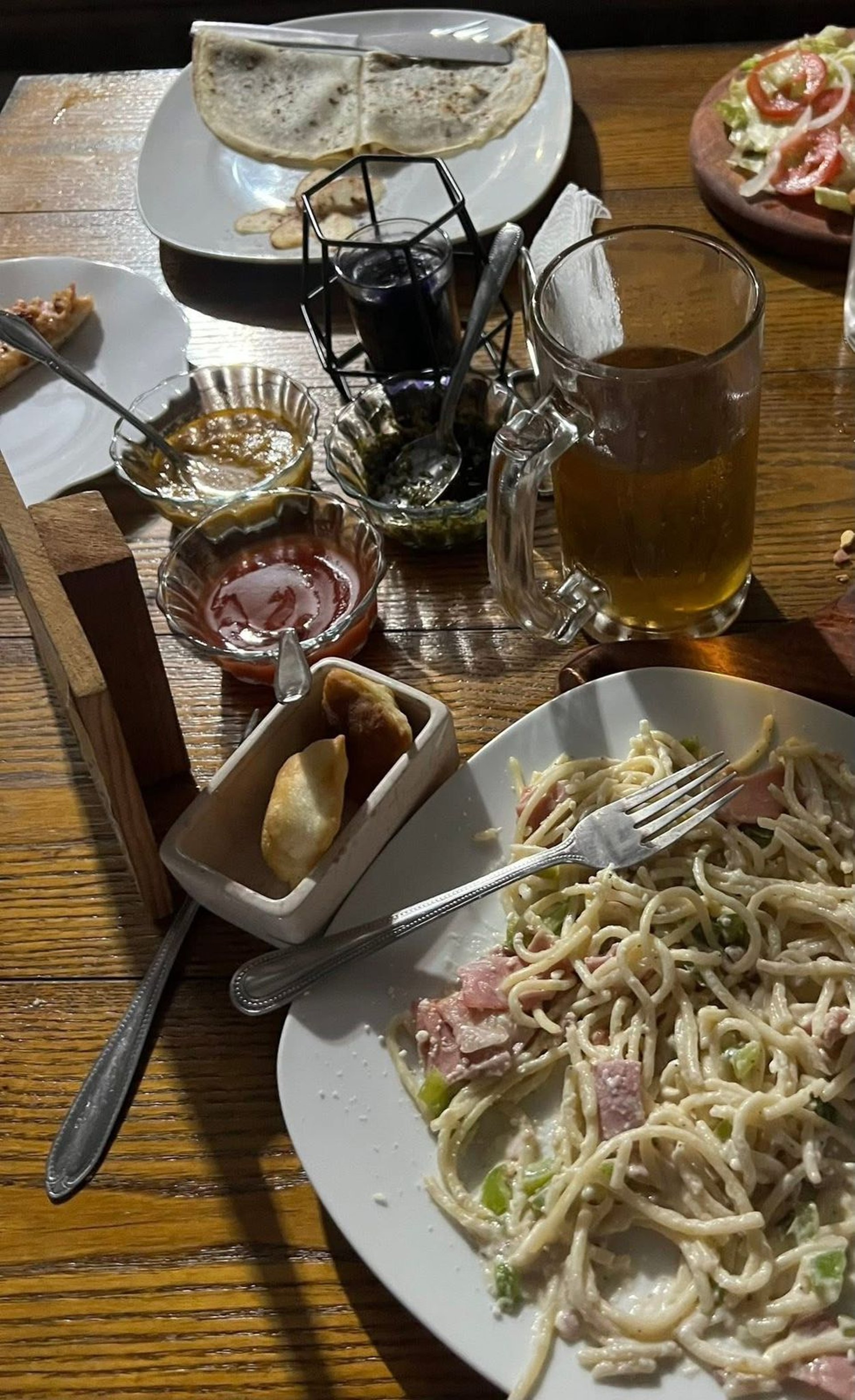 black and brown leather padded tub sofa