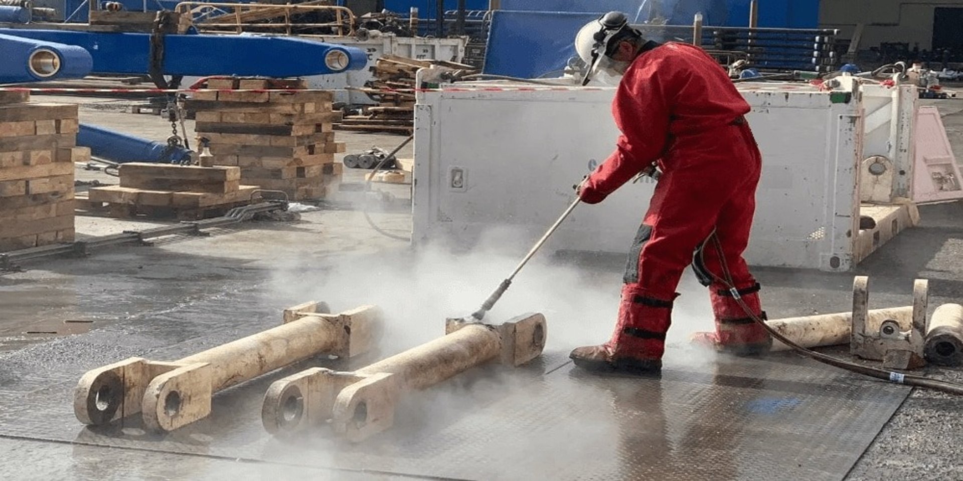 an abstract photo of a curved building with a blue sky in the background