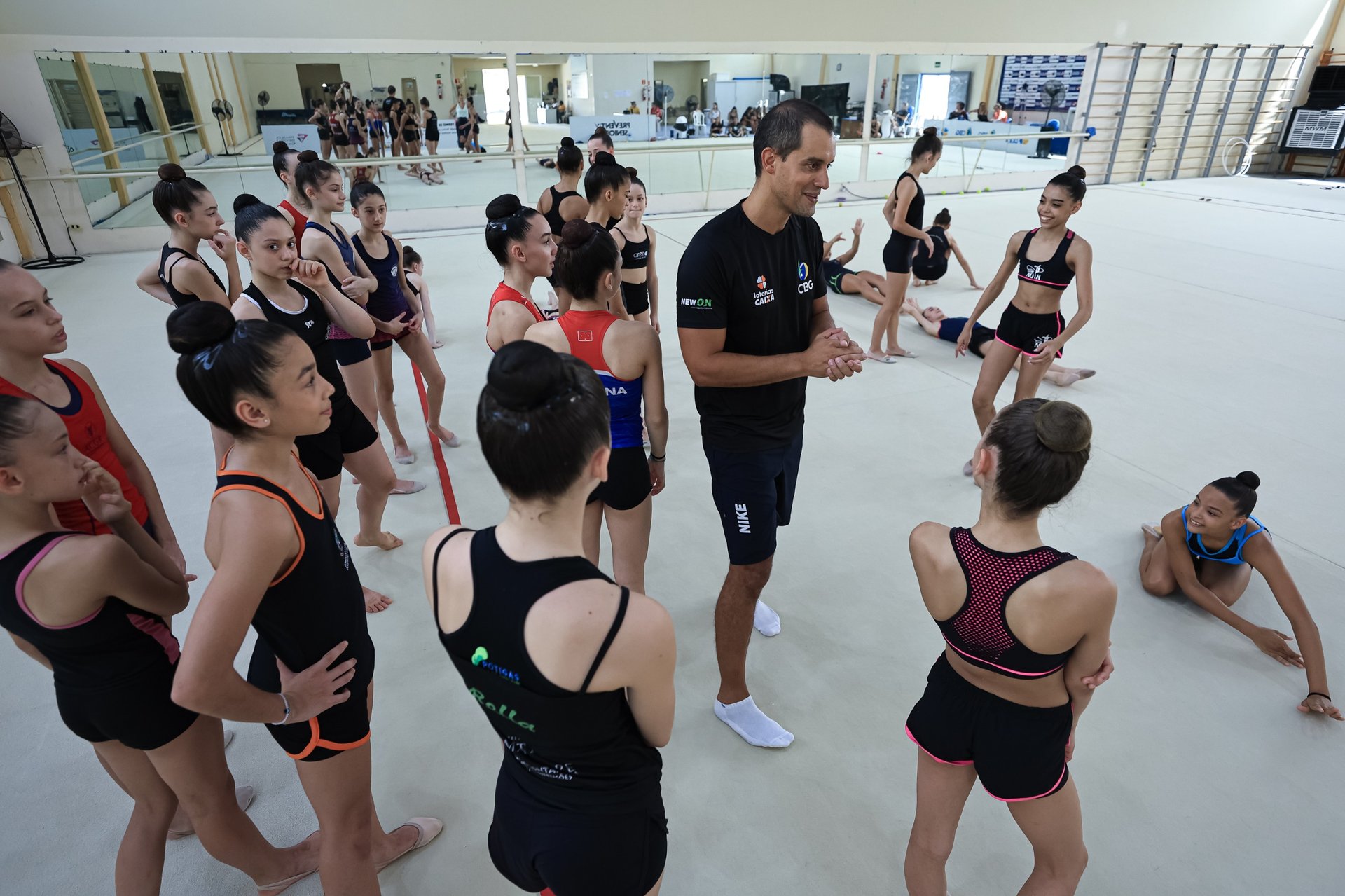 an abstract photo of a curved building with a blue sky in the background