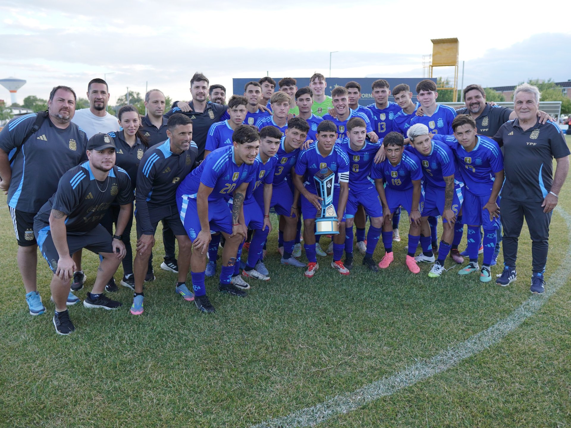 an abstract photo of a curved building with a blue sky in the background