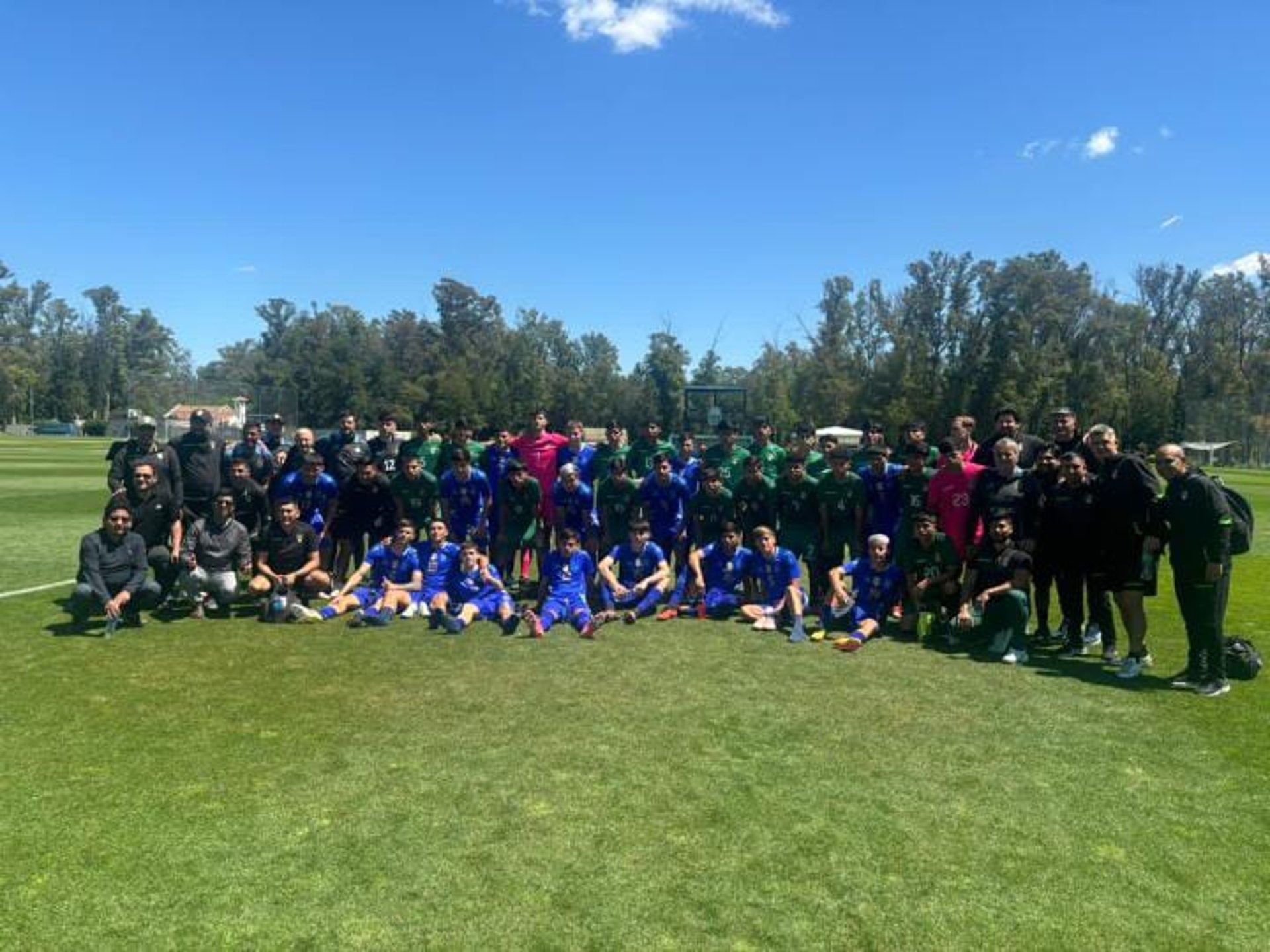 an abstract photo of a curved building with a blue sky in the background
