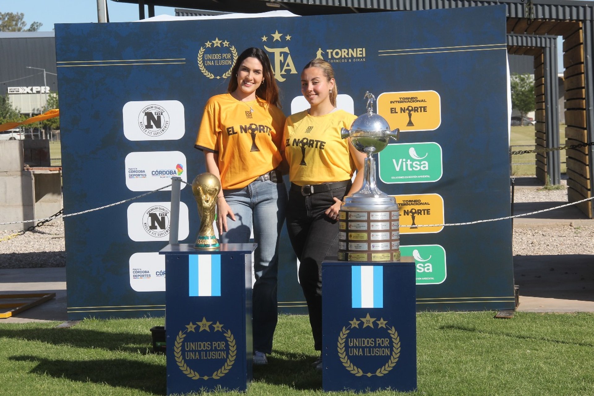 an abstract photo of a curved building with a blue sky in the background