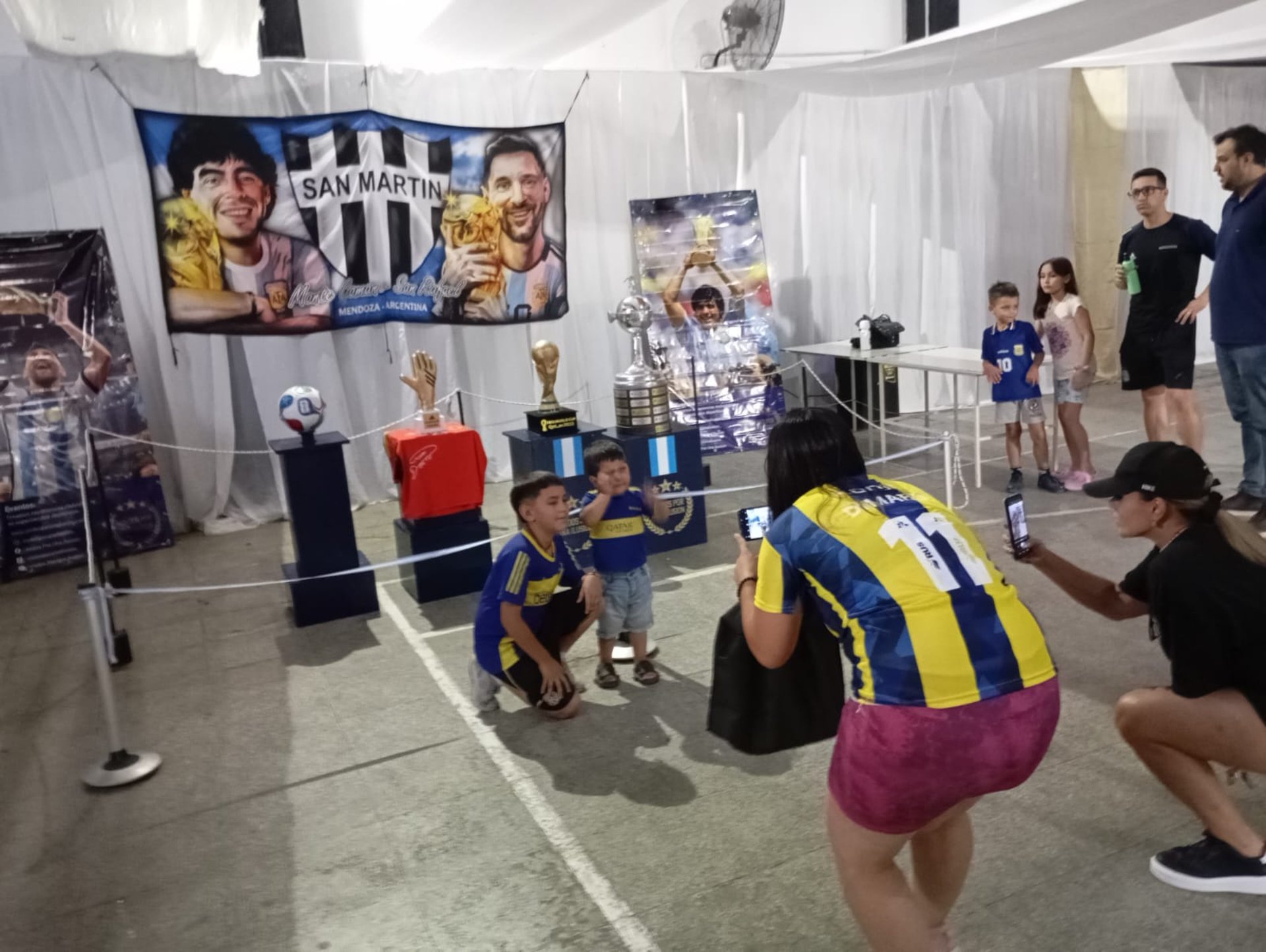 an abstract photo of a curved building with a blue sky in the background
