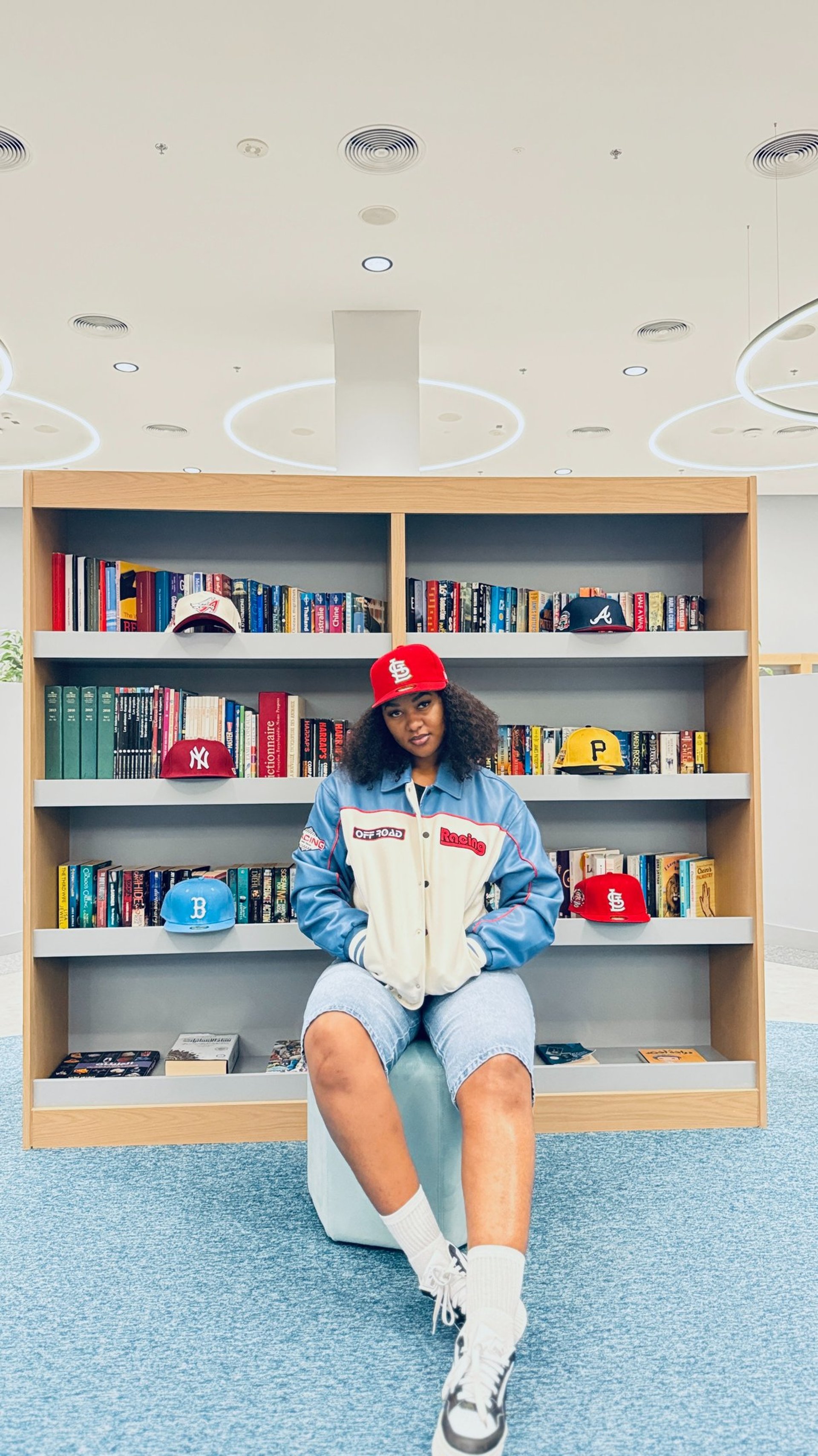 woman wearing yellow long-sleeved dress under white clouds and blue sky during daytime