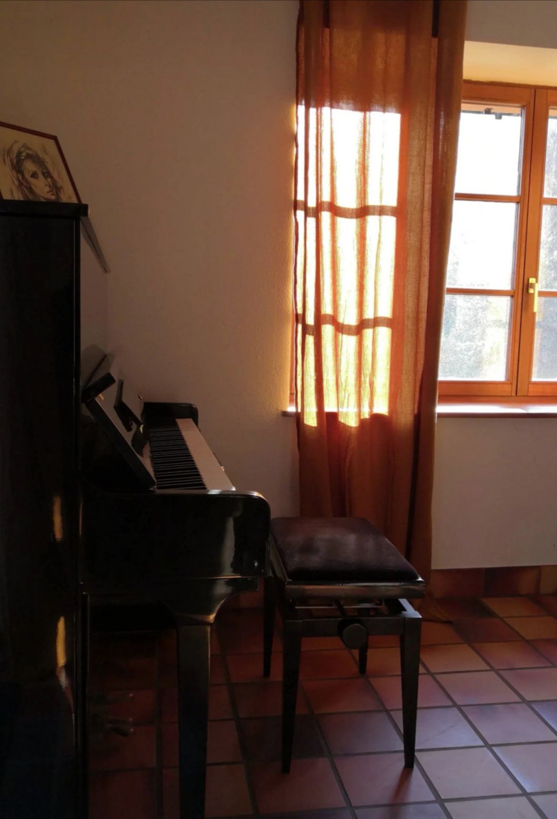 an abstract photo of a curved building with a blue sky in the background